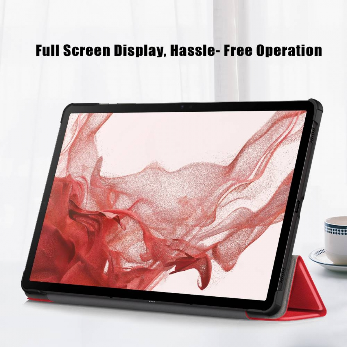Tablet mit rotem Bildschirm, der abstrakte Kunst zeigt, mit roter Hülle geöffnet.