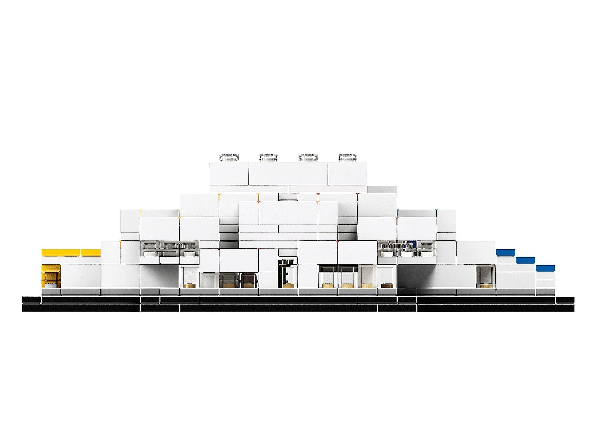 Çeşitli pencereleri ve mimari detayları olan beyaz bir LEGO bina modeli.