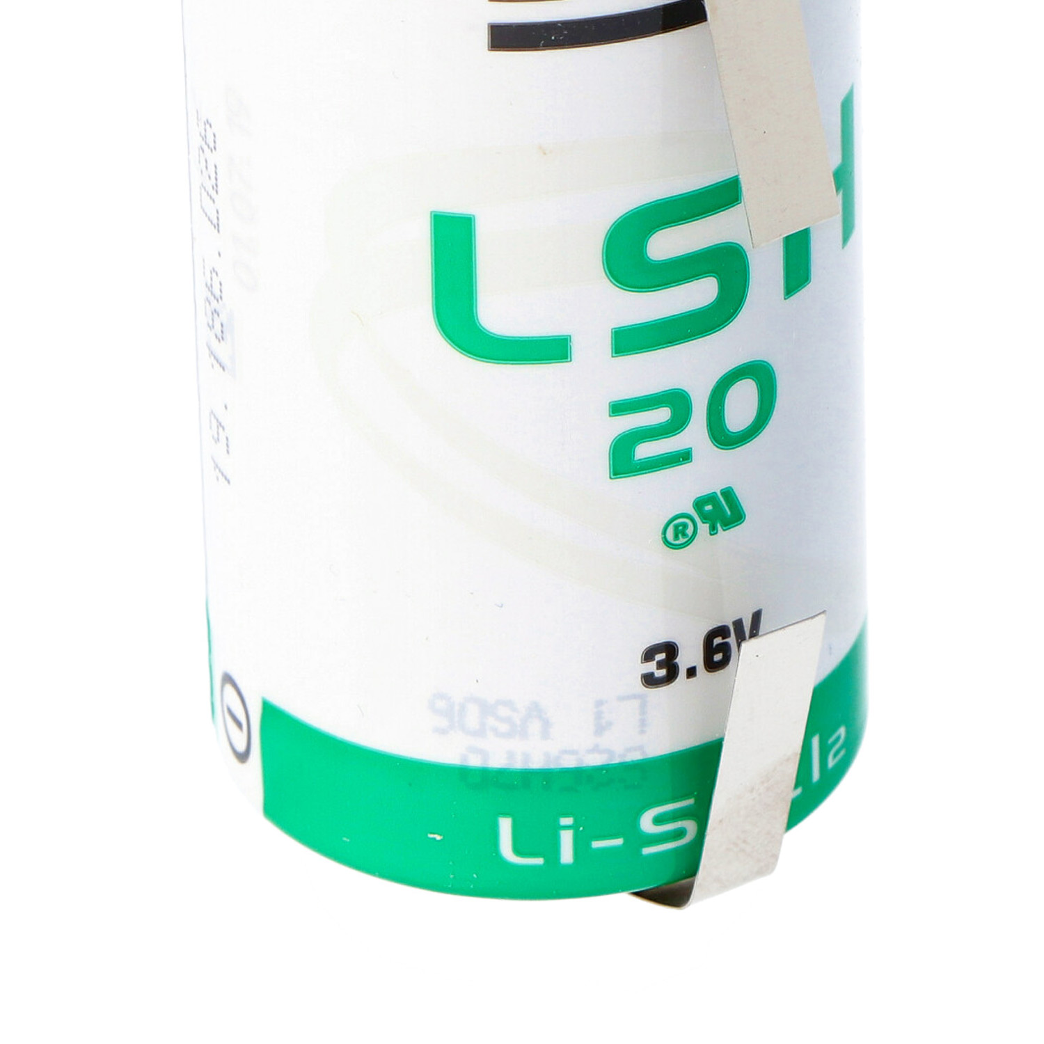 Nahaufnahme einer weißen und grünen Batterie. Text enthält 'LS 20' und '3,6V'.