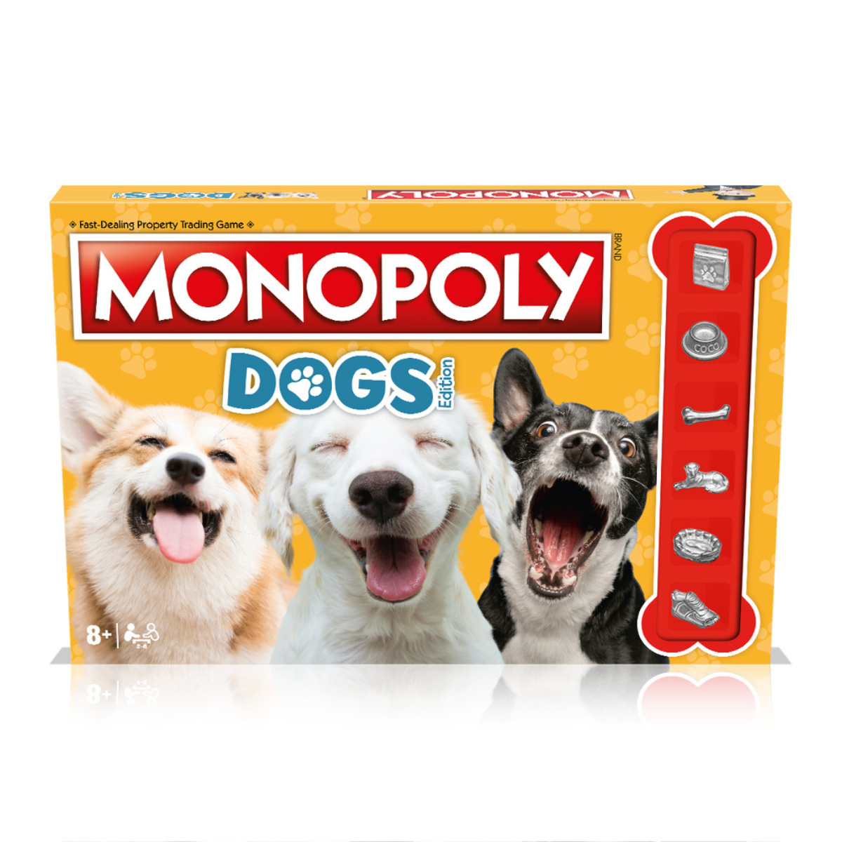 Scatola del gioco Monopoly Dogs Edition con tre cani sorridenti su sfondo giallo.