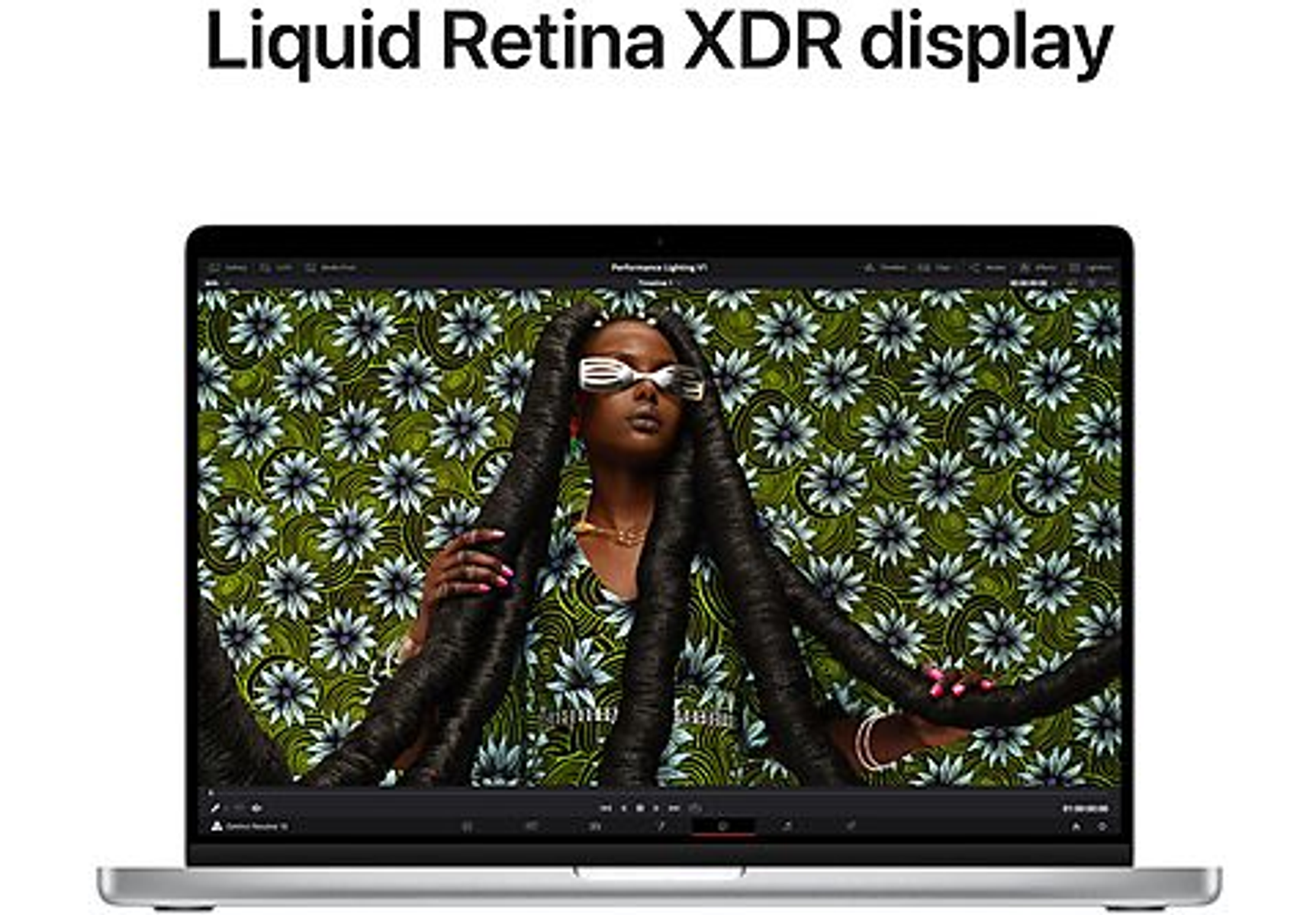 Pantalla de portátil que muestra a una mujer. Texto: 'Liquid Retina XDR display'.