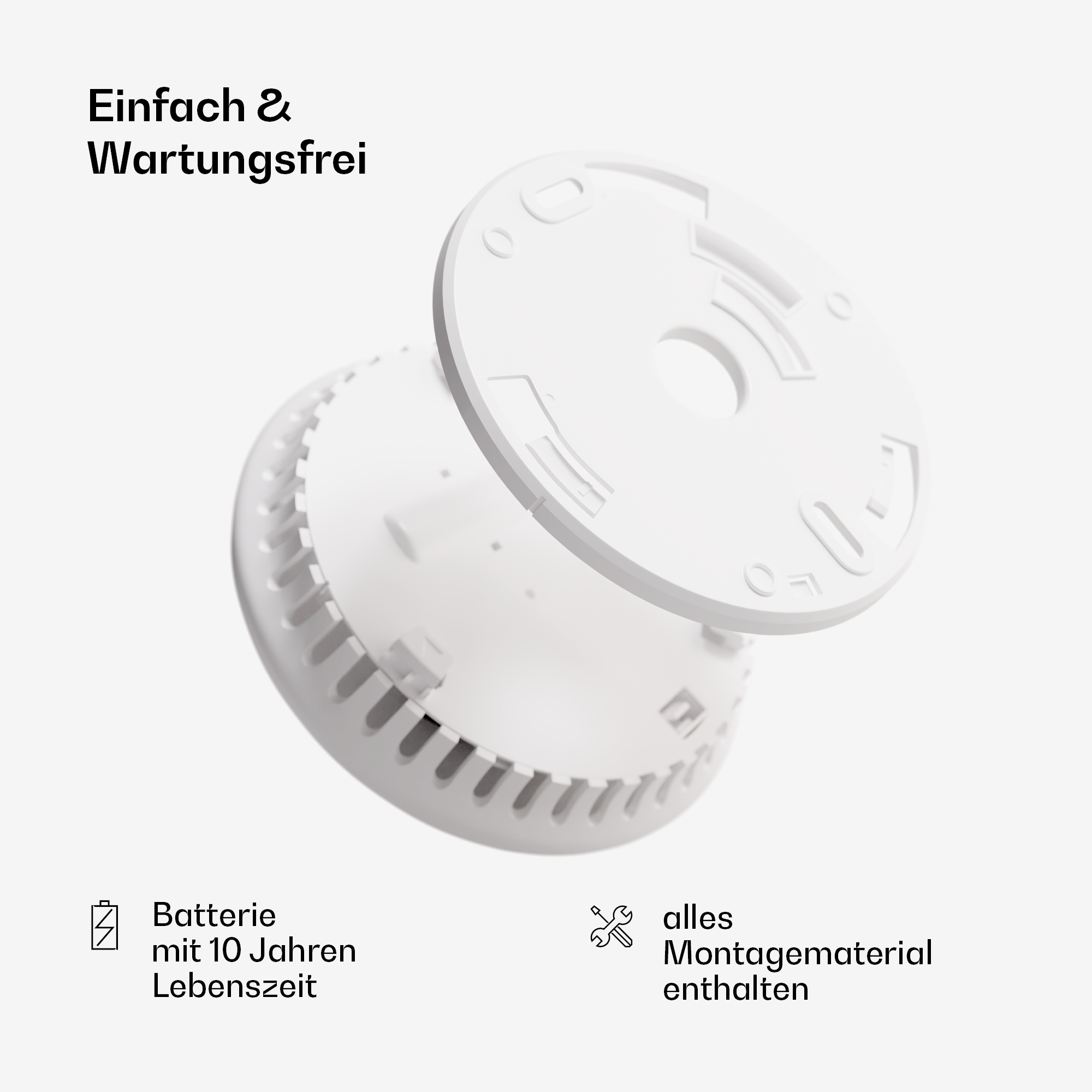 Rilevatore di fumo bianco con testo sulla batteria e il montaggio.