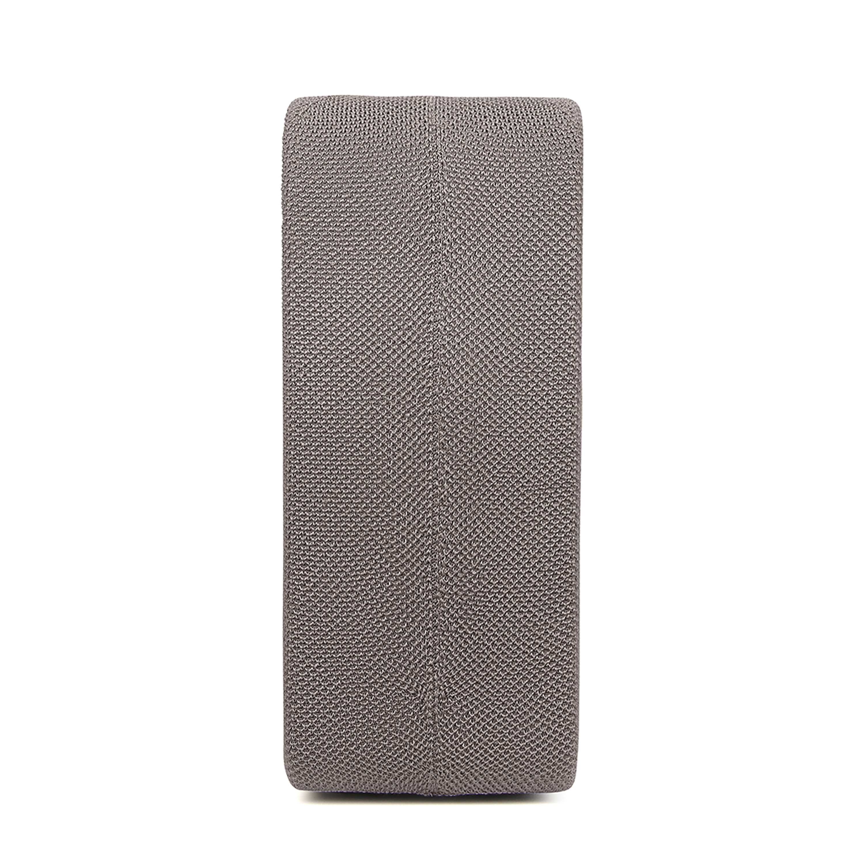 Oreiller rectangulaire marron, probablement un oreiller de cou ou pour un soutien lombaire. La texture est visible.