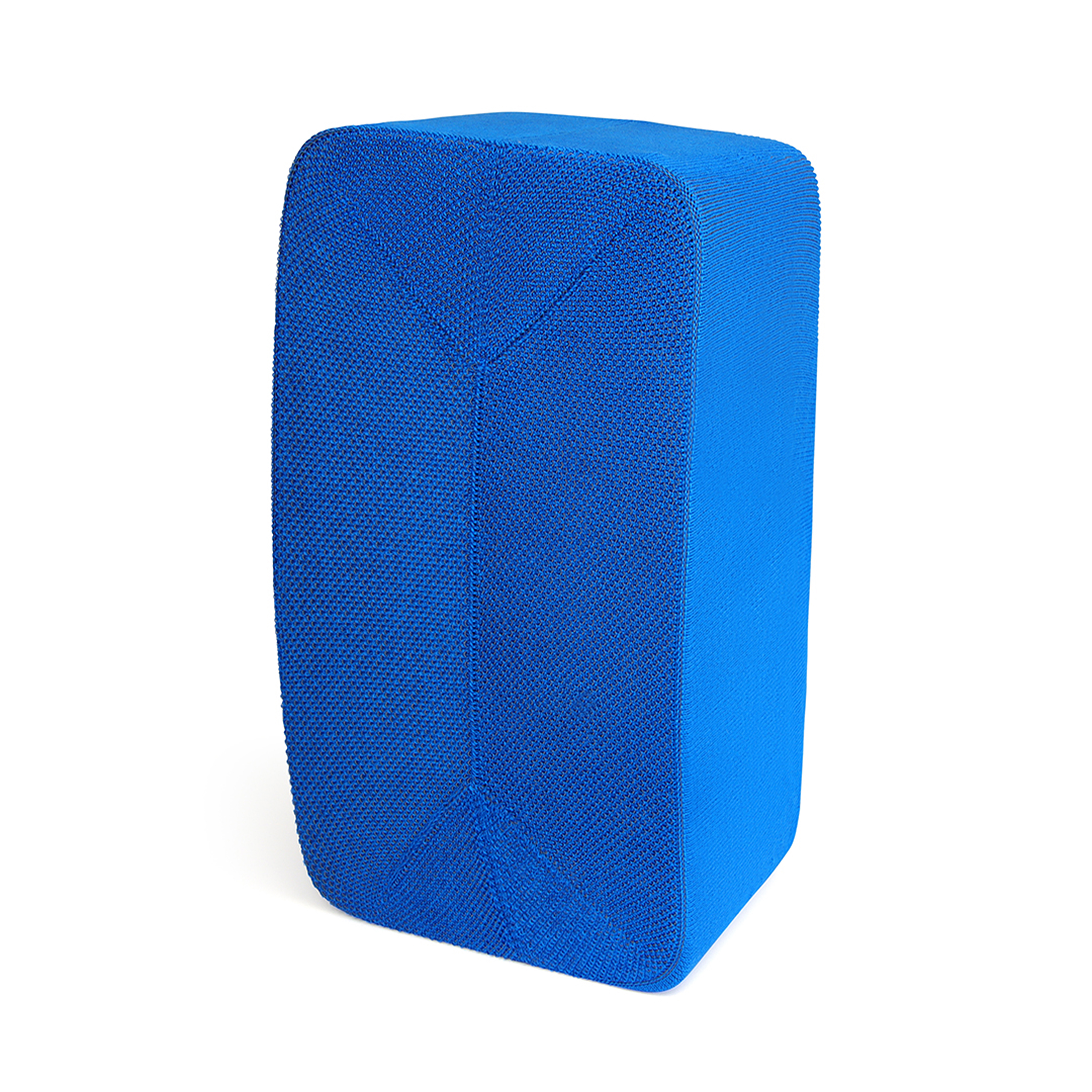Bloc bleu, rectangulaire, texturé. Bords arrondis, orientation verticale, sur fond blanc.