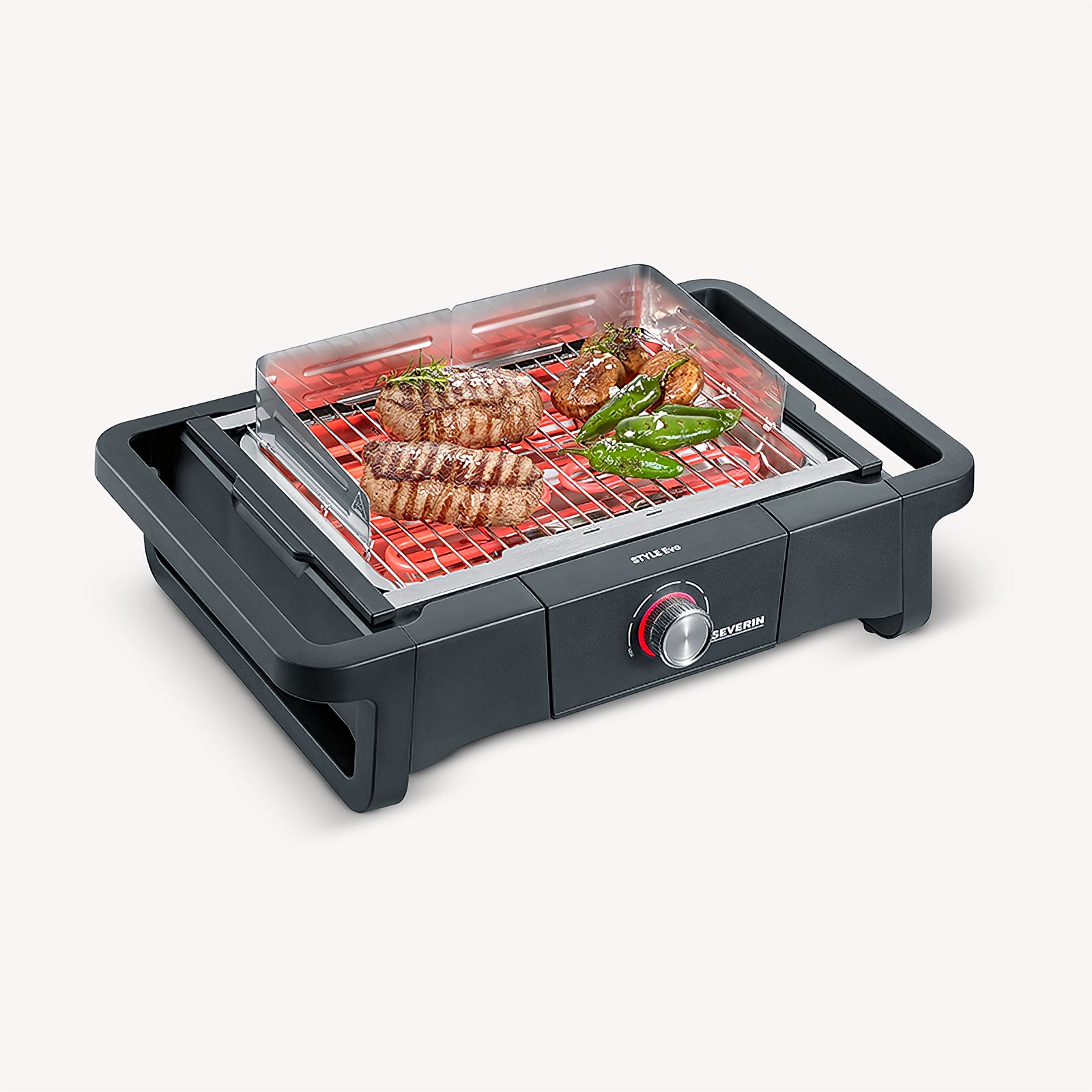 Una griglia elettrica con cibo che cuoce sopra. Sono visibili bistecche e peperoni.