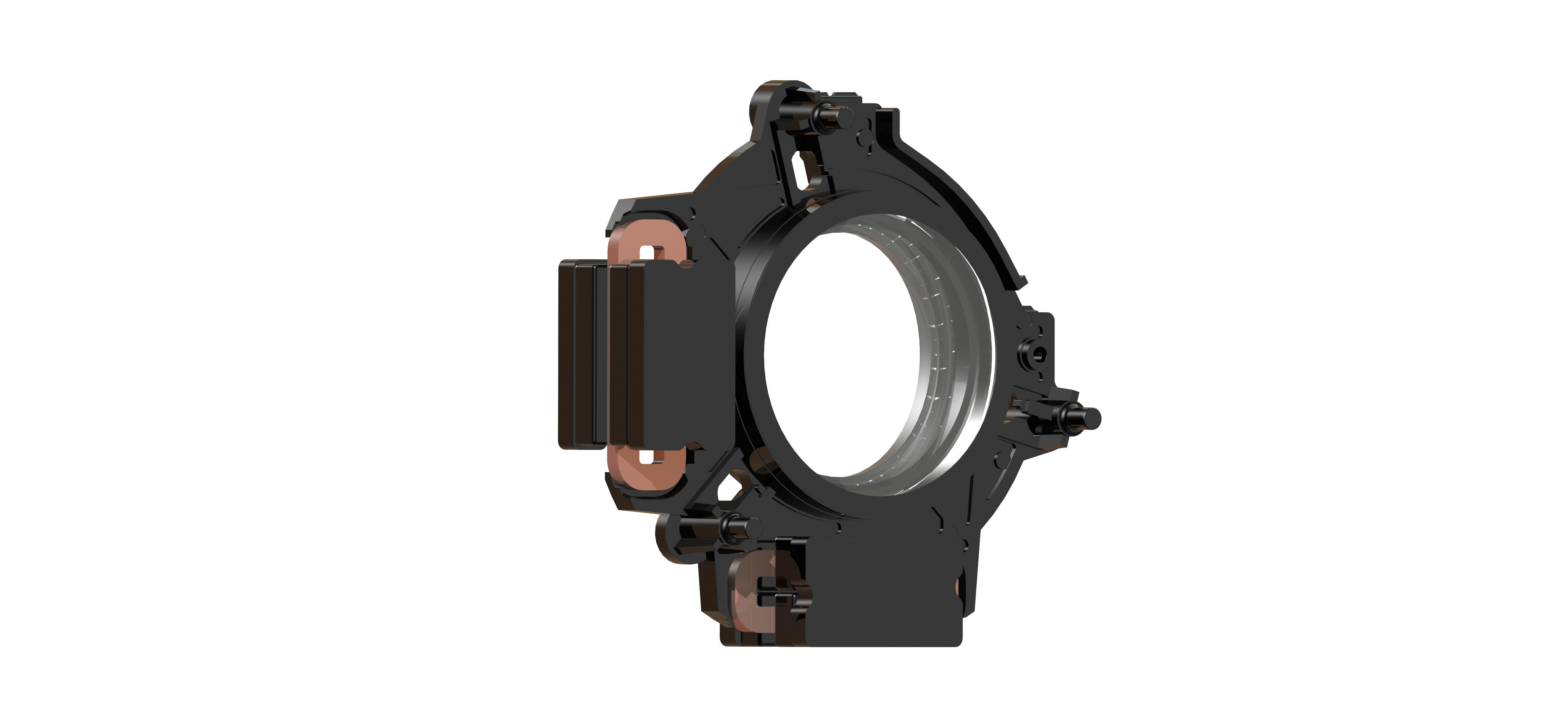 Czarny obiekt z elementami w kolorze miedzi, prawdopodobnie część silnika, na białym tle.