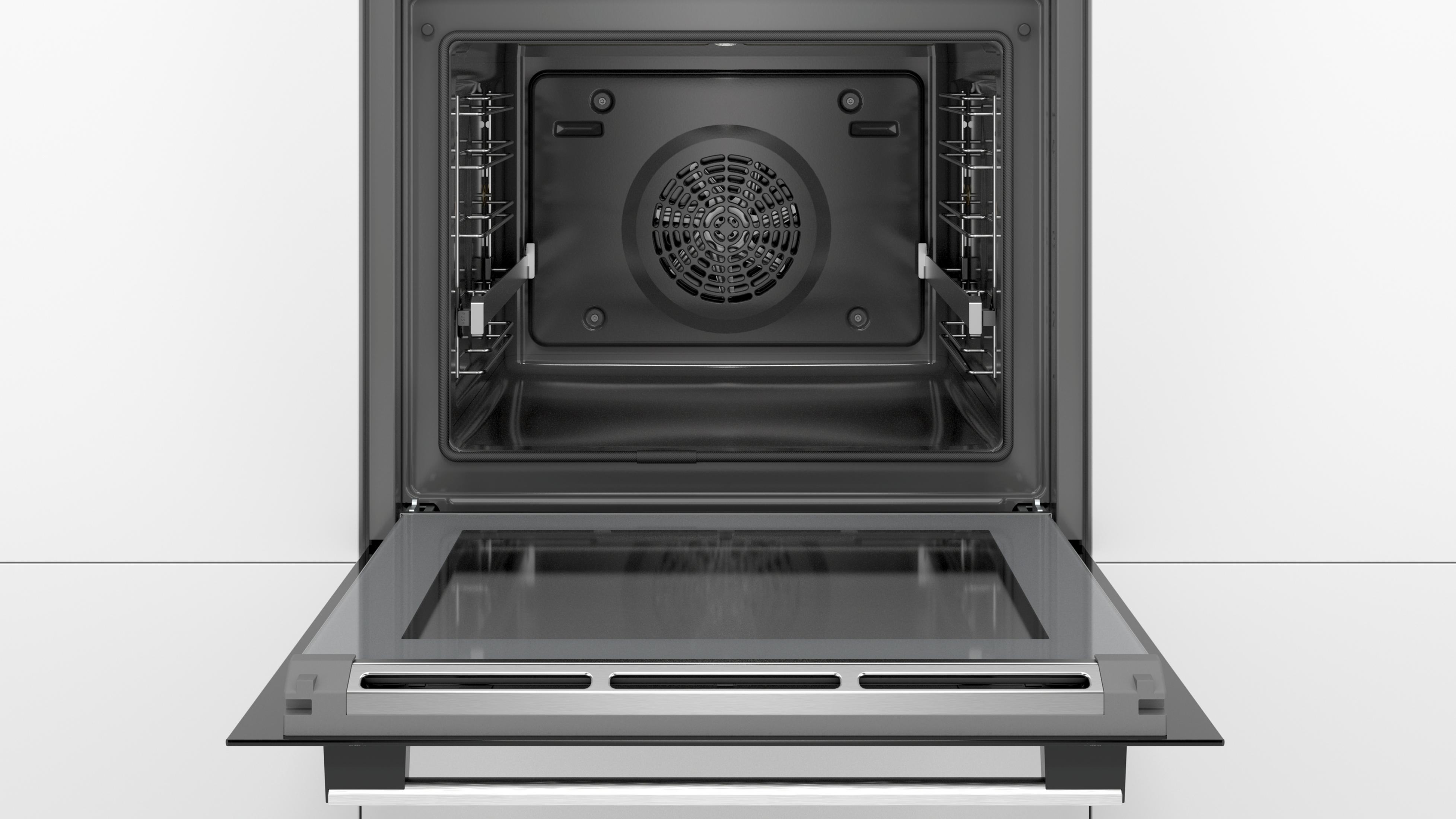 Un horno abierto con la puerta abajo, mostrando el interior.