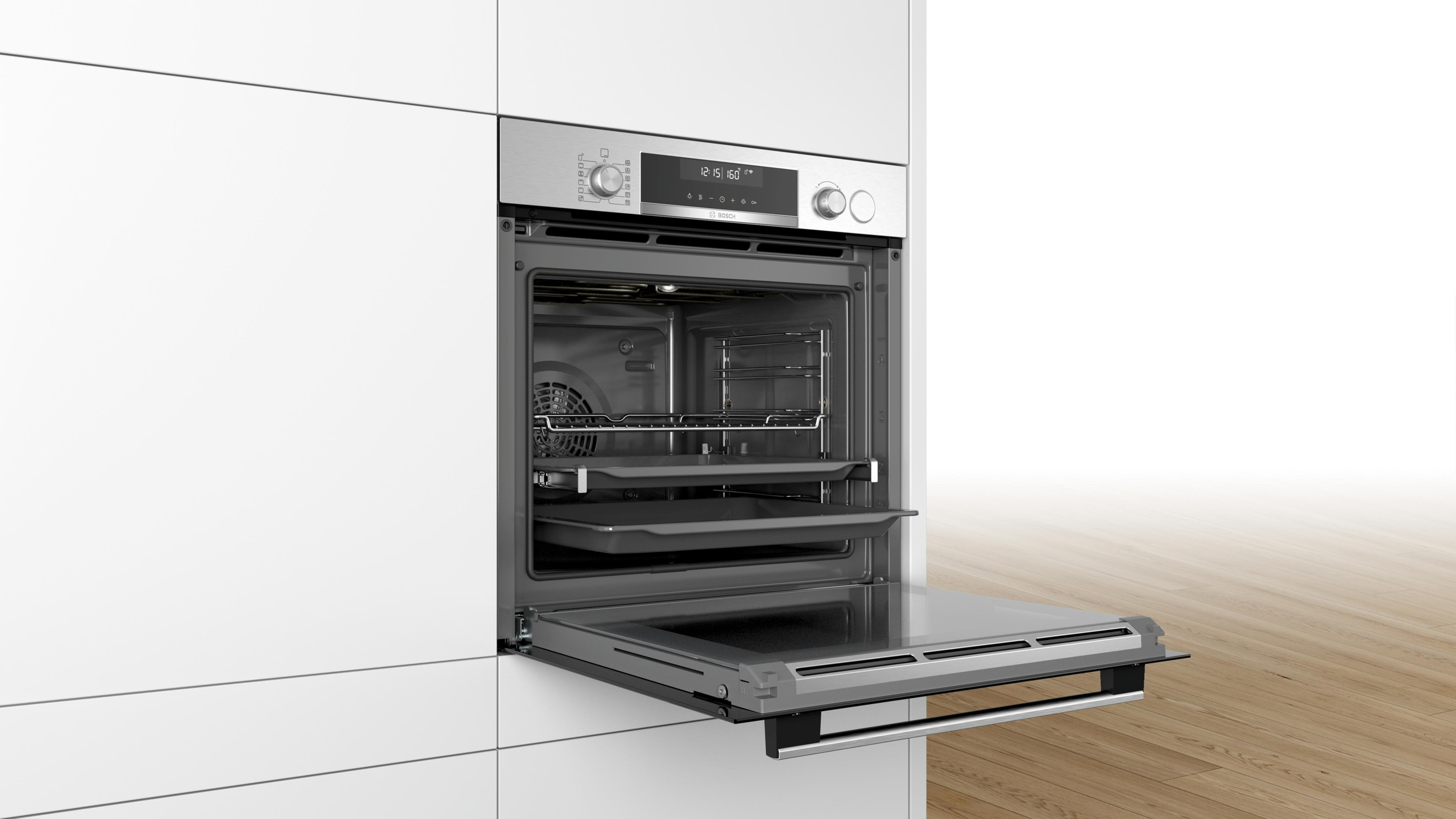 Horno empotrado abierto, mostrando estantes interiores y una pantalla digital.