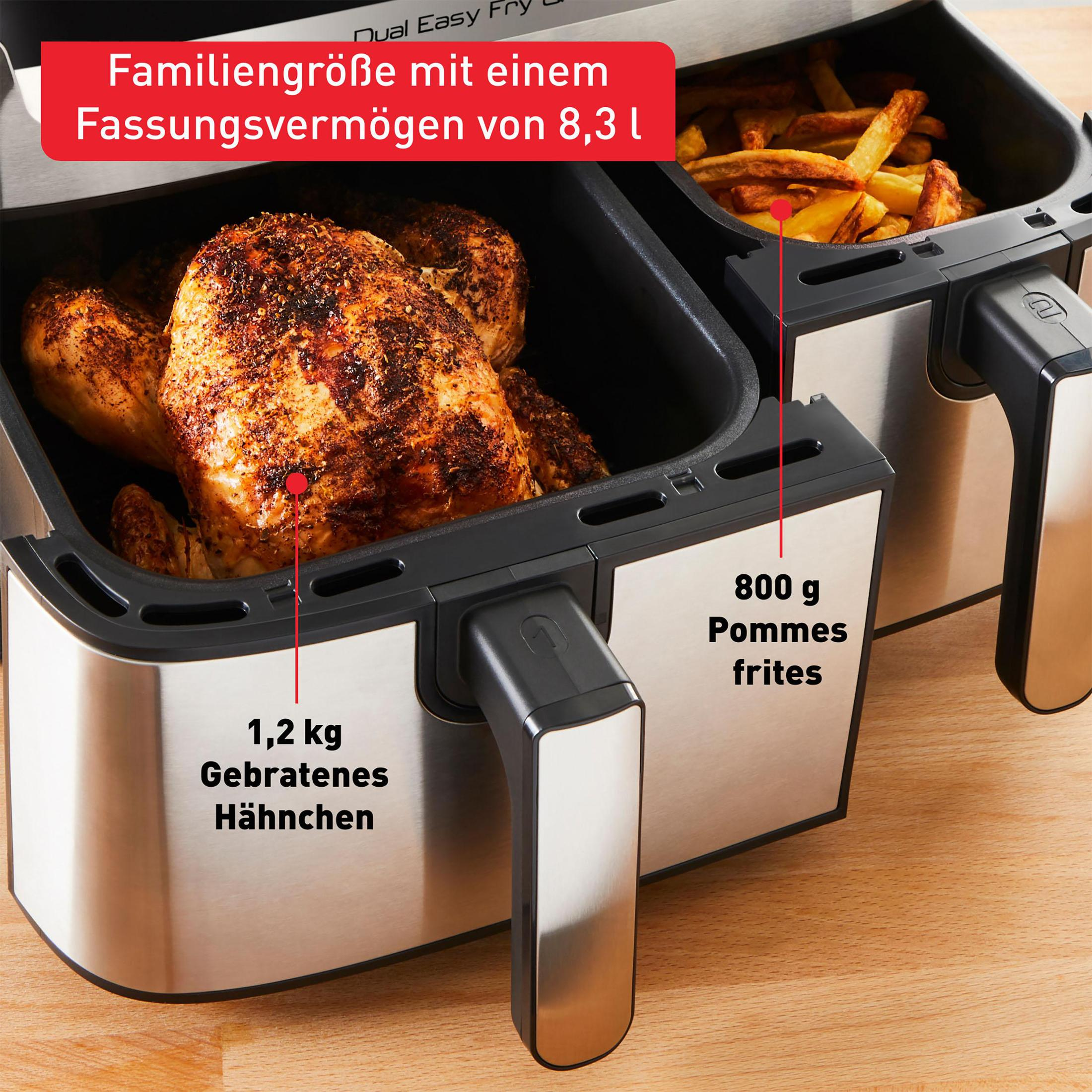 Heißluftfritteuse mit Hähnchen und Pommes darin. Es zeigt Etiketten auf Deutsch.