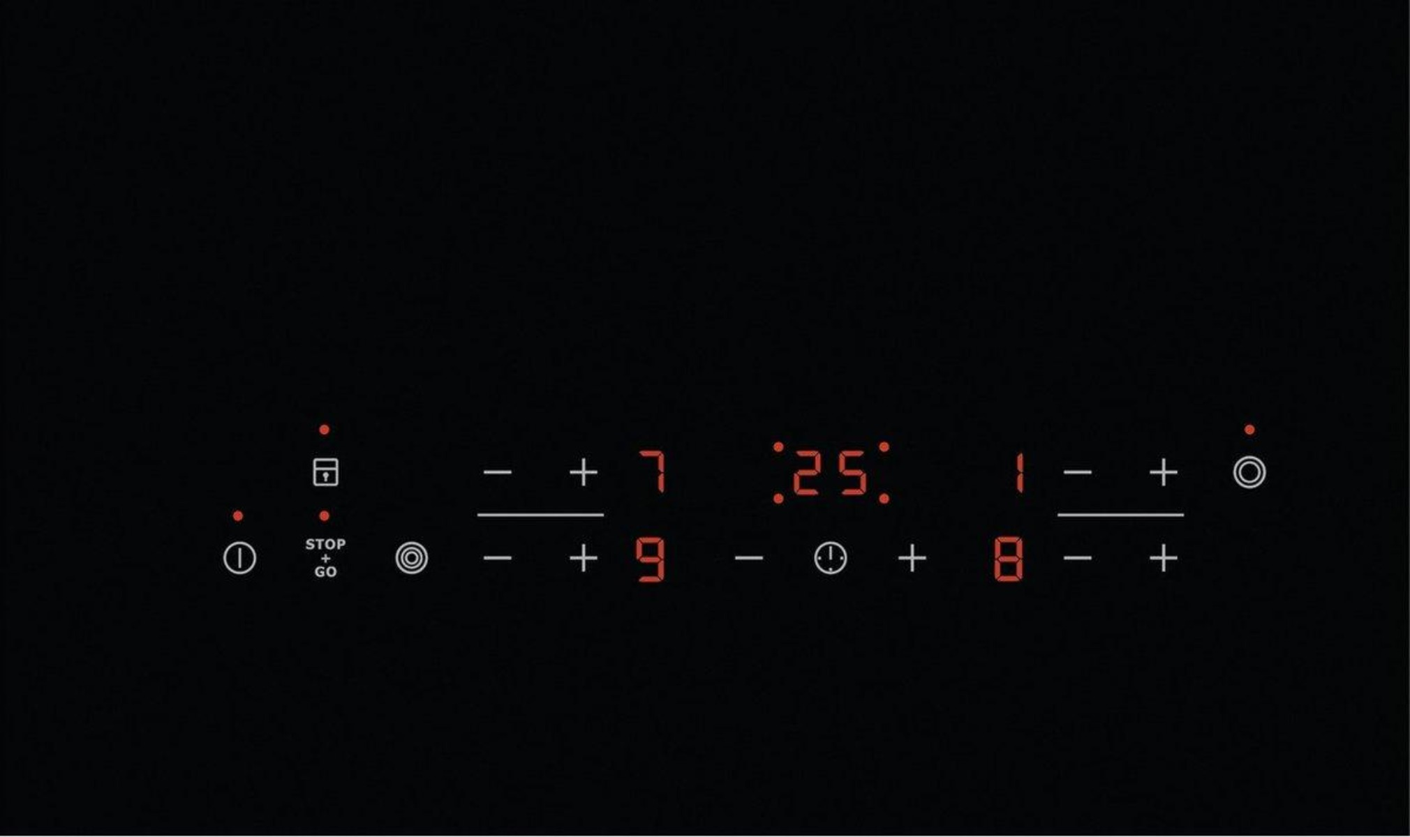 Czarna cyfrowa płyta grzewcza z czerwonymi cyframi i symbolami do sterowania.