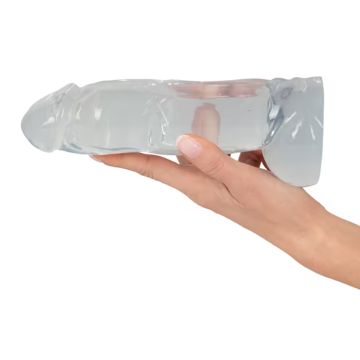 Ein klares Sexspielzeug, das von einer Hand gehalten wird, mit einer langen, zylindrischen Form.