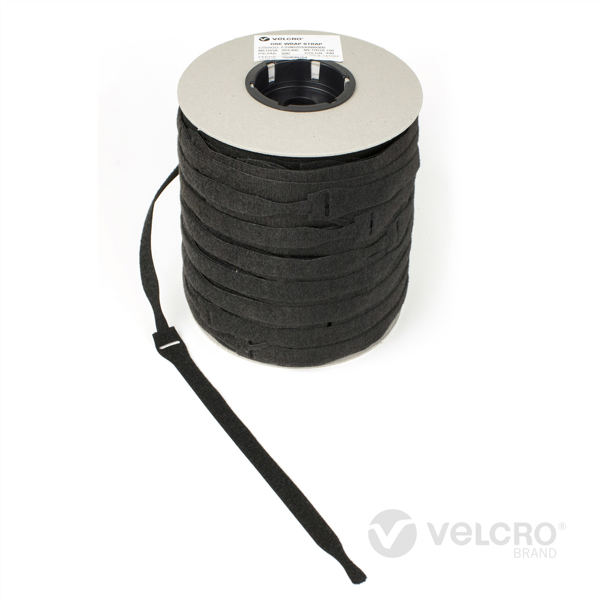 Eine Rolle schwarzer VELCRO ONE-WRAP-Gurte, mit einem Gurt, der sich von der Rolle erstreckt.