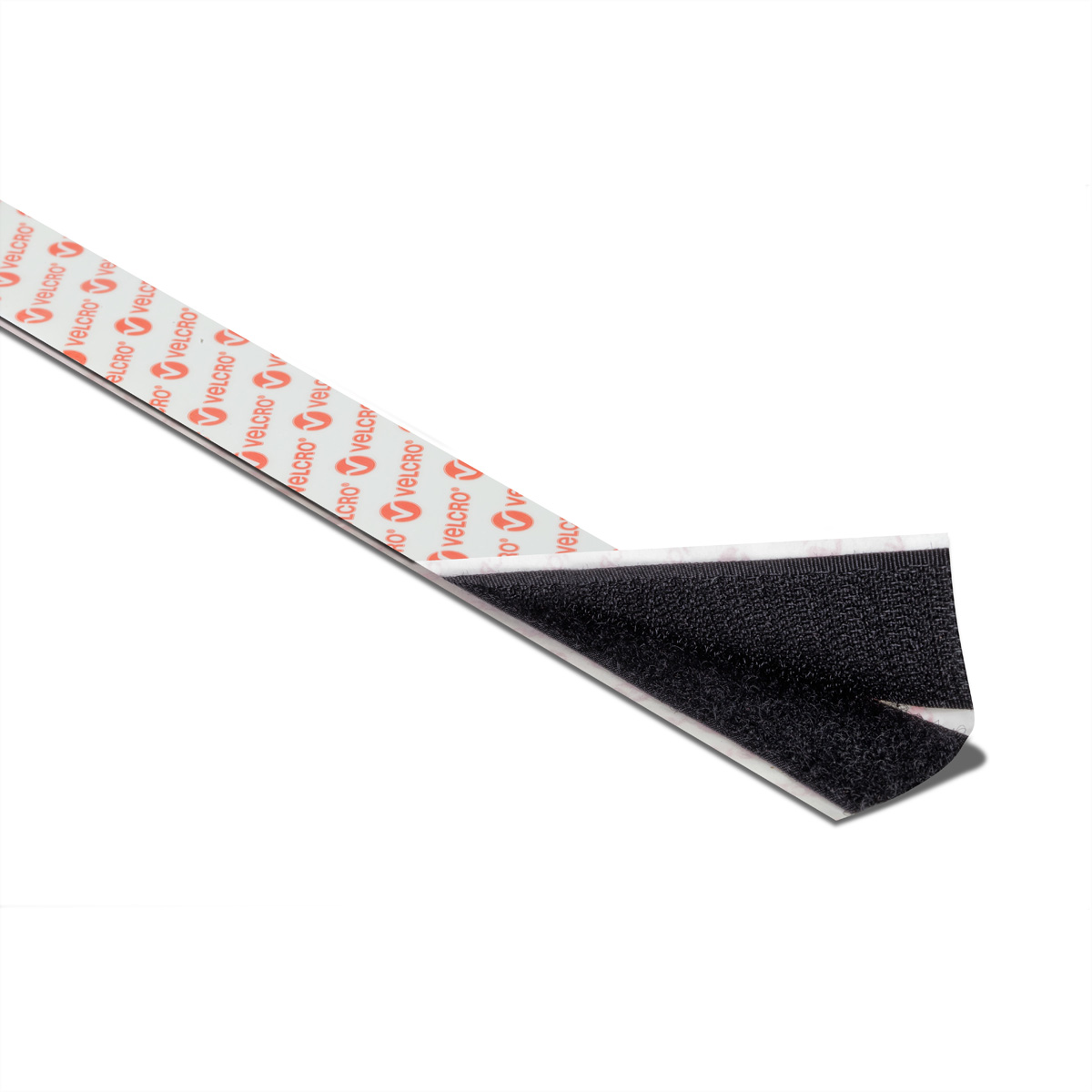 Klittenbandstrips, zwart. Eén strip los, de lijm zichtbaar.