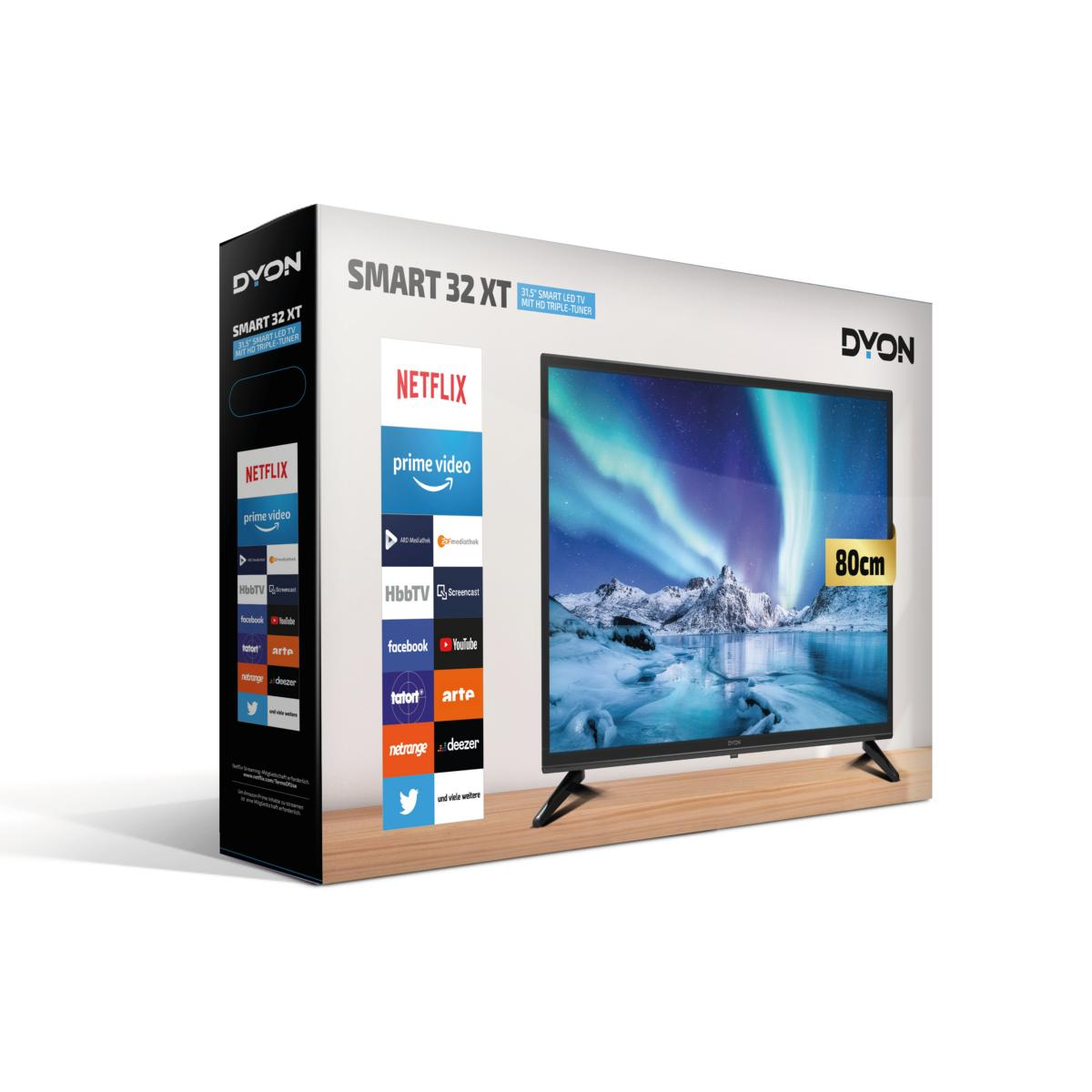 TV-Box mit einem Fernseher, der eine Landschaft zeigt, Logos für Streaming-Dienste sind seitlich.