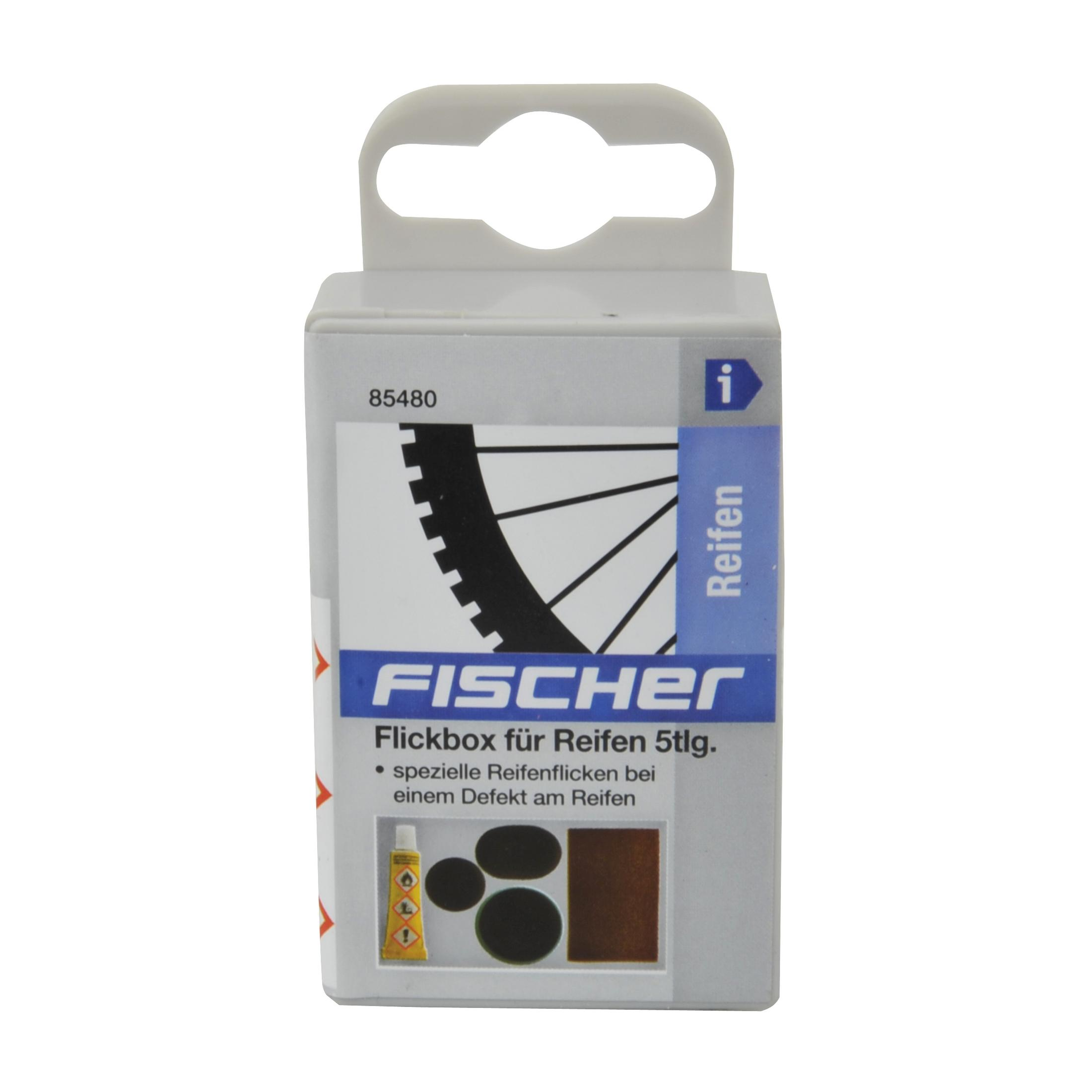 Eine Box mit einem Reifen-Reparatur-Set. Die Box hat ein Bild eines Fahrradreifens und den Markennamen FISCHER.