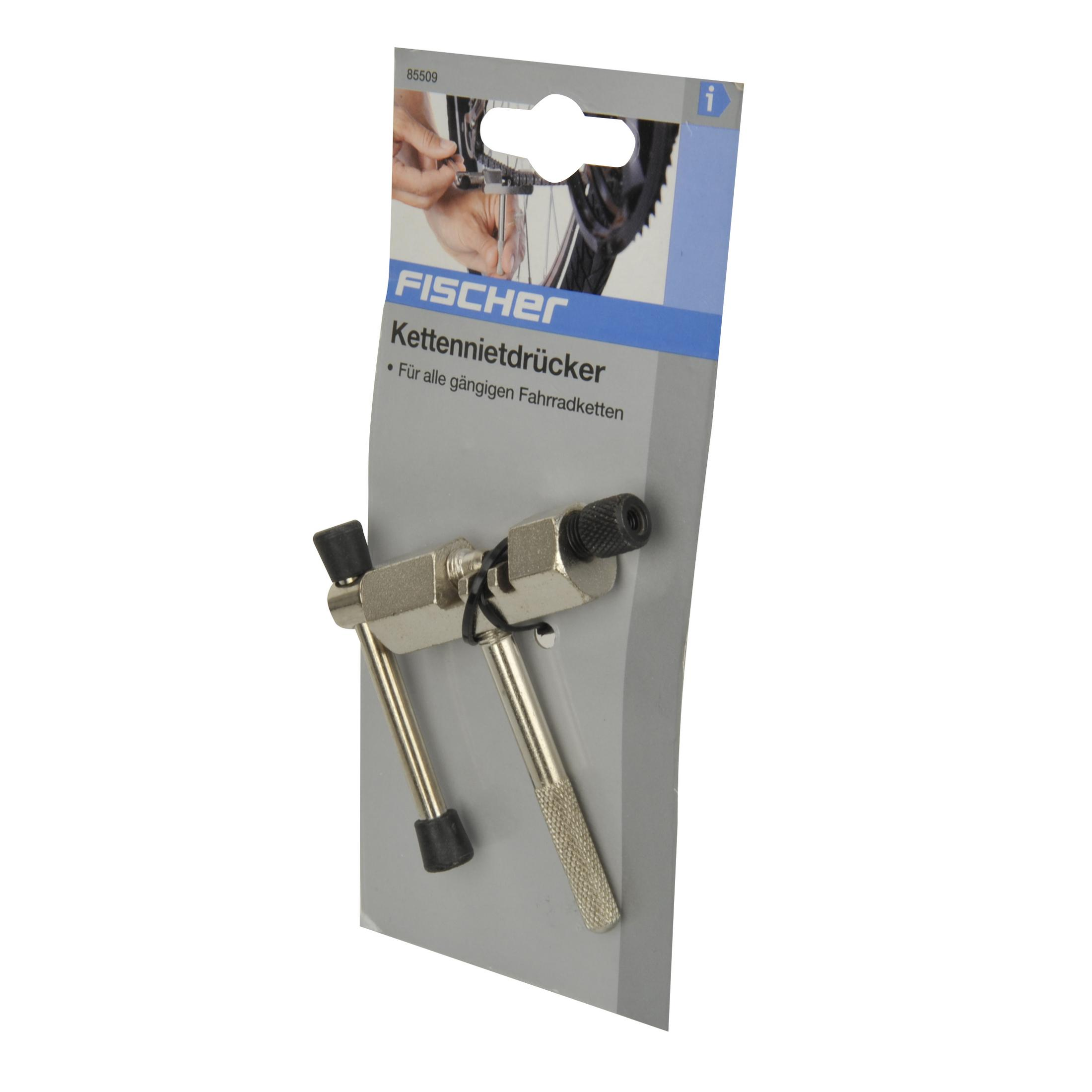 Ein Kettennietwerkzeug auf einer Verpackung, mit einer Fahrradkette und Anweisungen sichtbar.