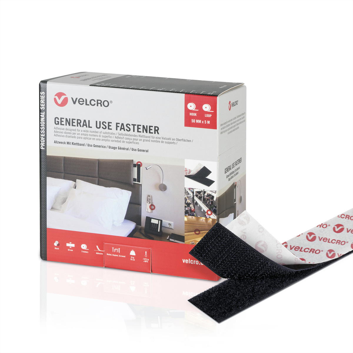 Una scatola di chiusure in velcro. È attaccata una striscia di velcro nera, che mostra i lati a uncino e ad anello.