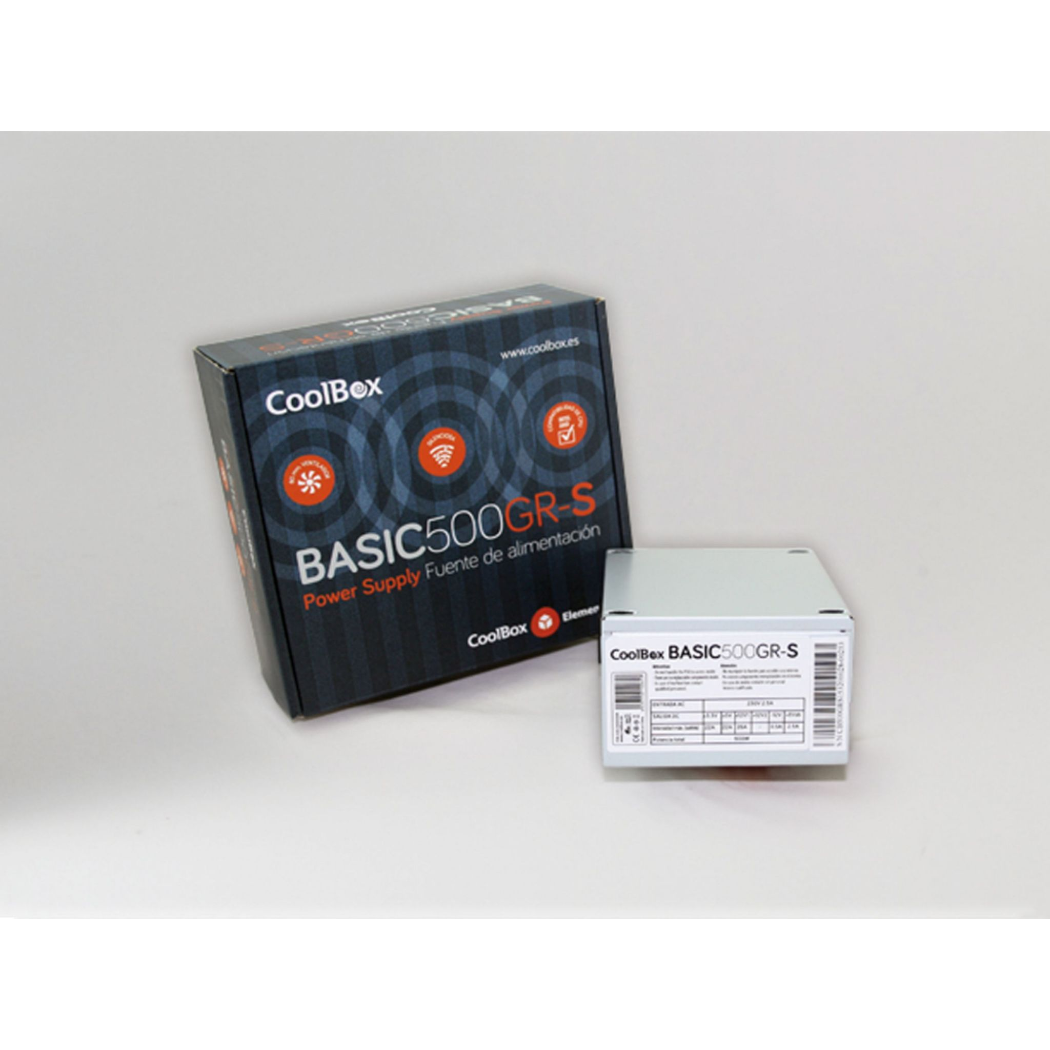 Scatola alimentatore CoolBox BASIC500GR-S e un'unità più piccola accanto su una superficie bianca.