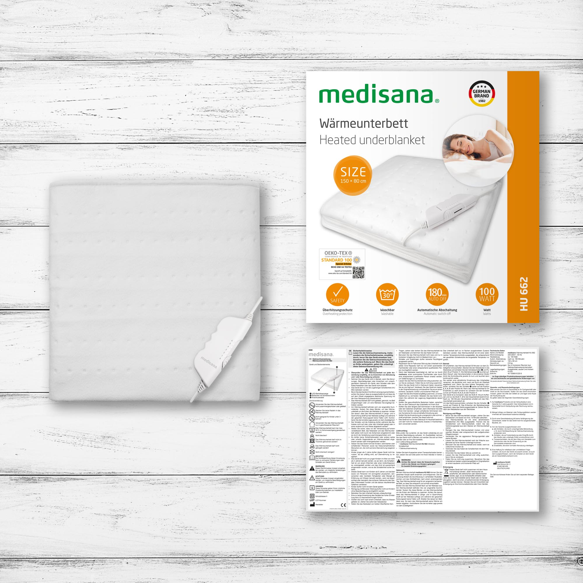 Opakowanie podgrzewanego koca. Biały koc, instrukcje i tekst: Ogrzewany koc, Medisana.