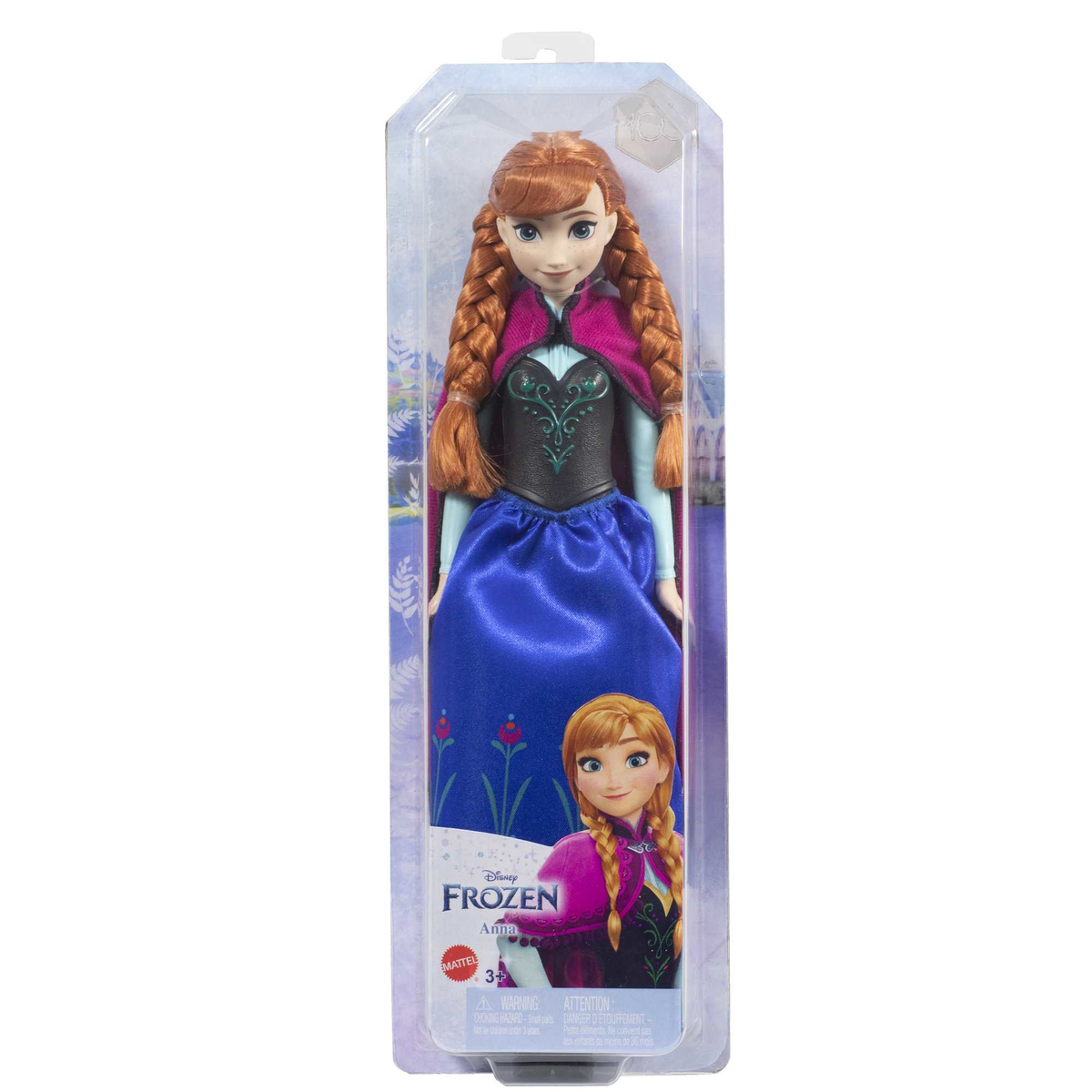 Lalka Disney Frozen w przezroczystym opakowaniu. Lalka ma rude włosy, niebieską sukienkę i pelerynę.