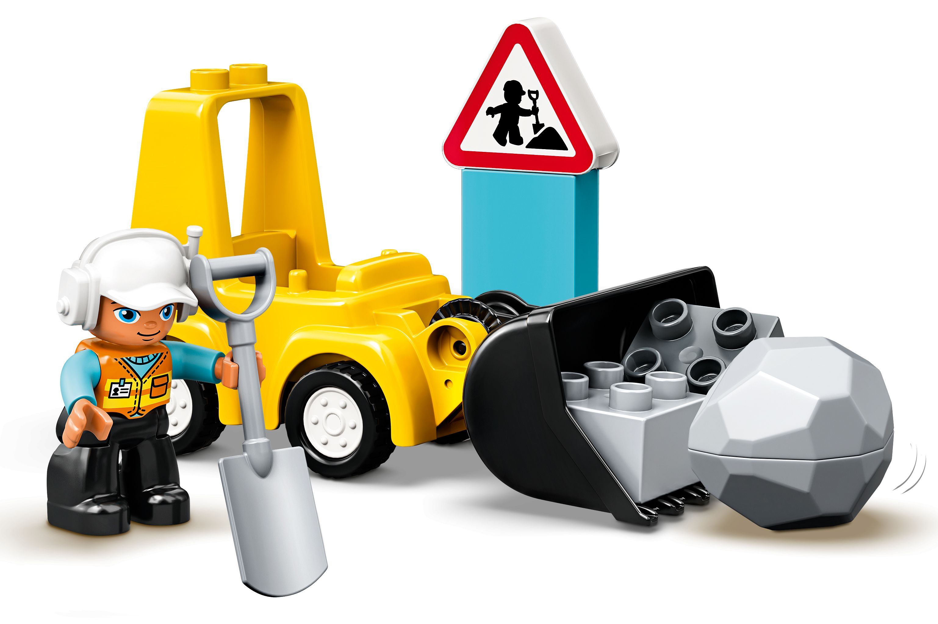 Ein gelbes Bauspielzeug-Set mit einem Arbeiter und einem Straßenschild.