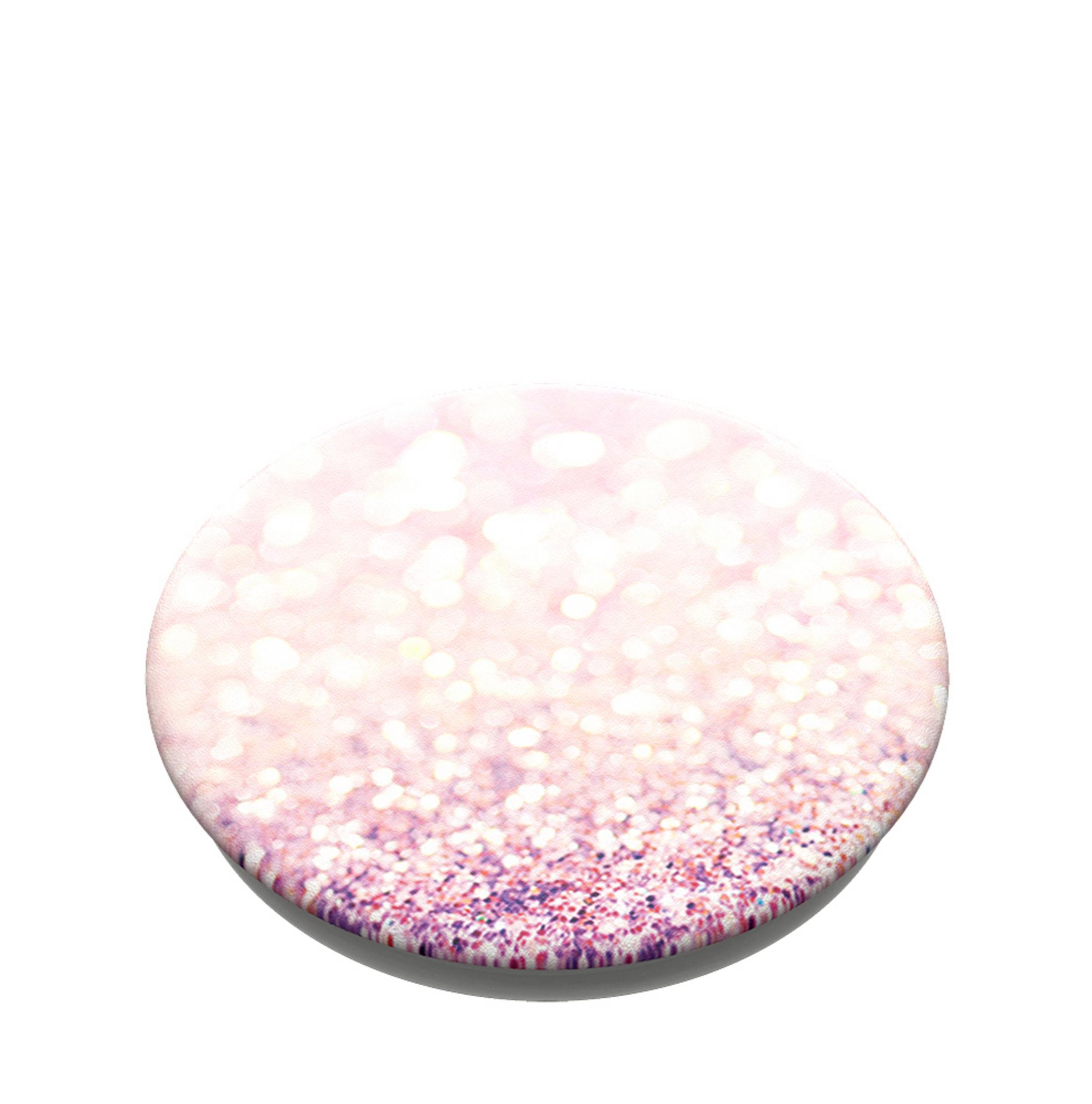 Eine runde, rosa und weiße glitzernde Oberfläche. Der Glitzer konzentriert sich am Boden.