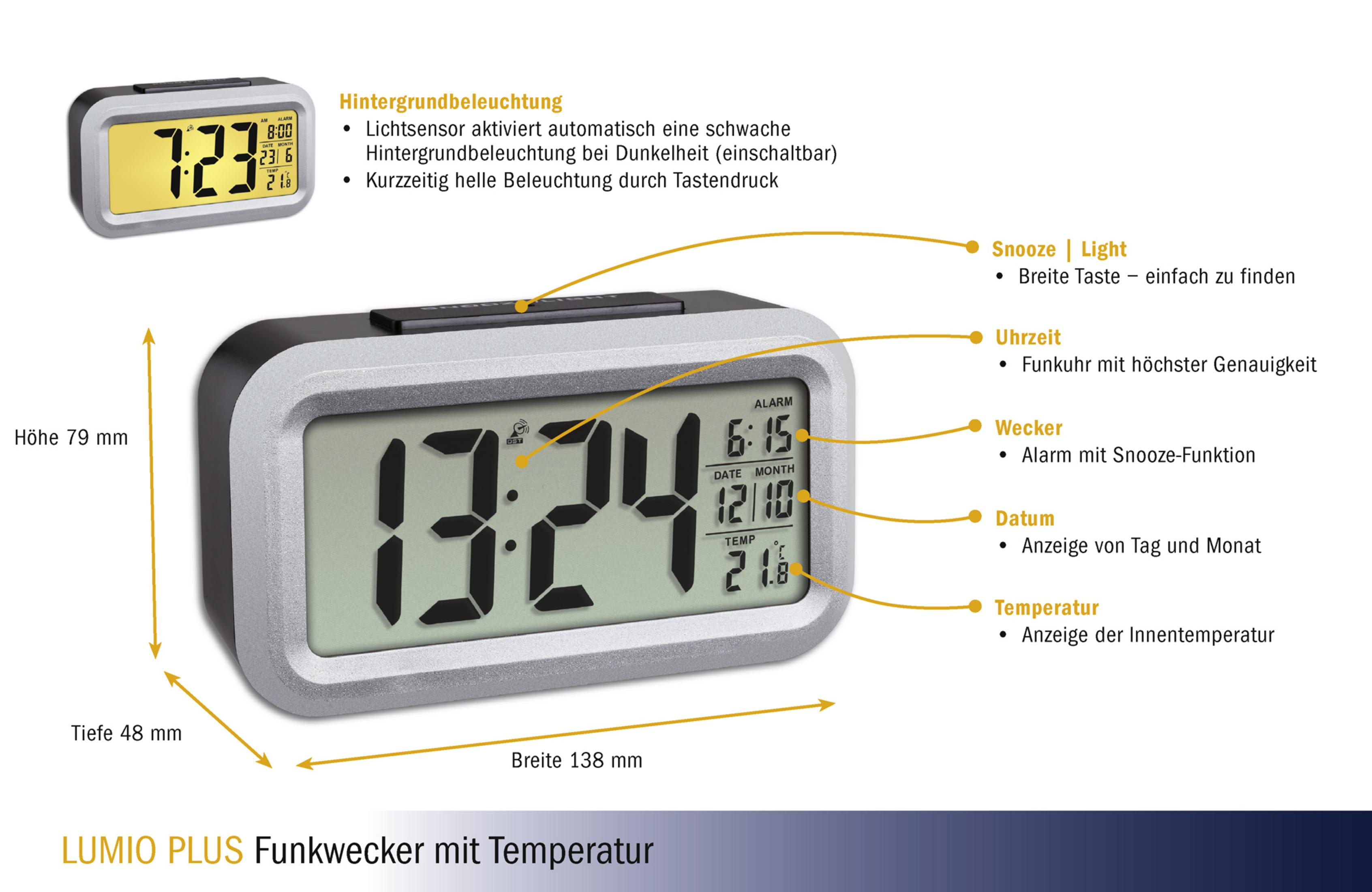 Digitaler Wecker mit schwarzem und silbernem Gehäuse. Die Anzeige zeigt Uhrzeit, Datum und Temperatur.