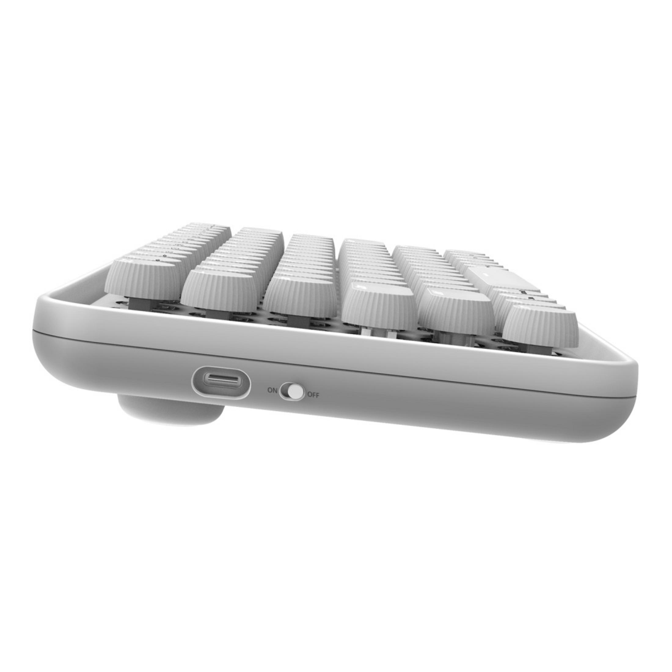 Tastiera bianca, vista laterale. La tastiera ha tasti bianchi e una porta USB-C.