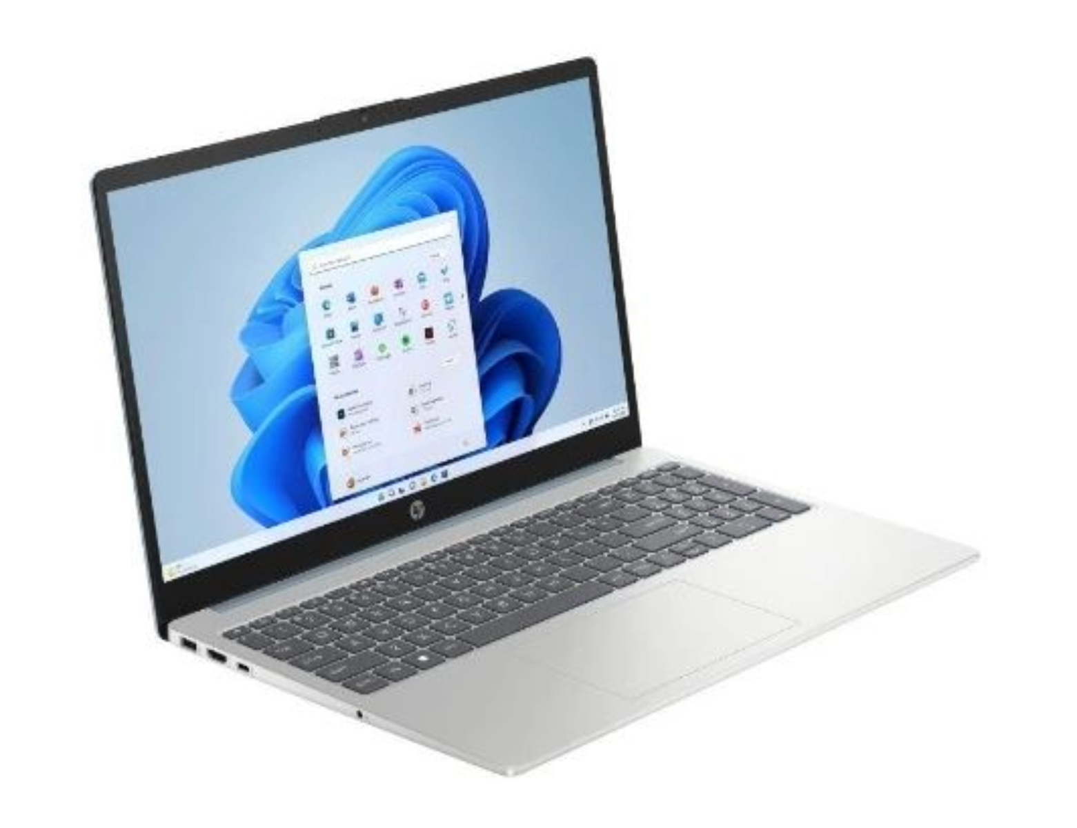 Laptop plateado abierto, mostrando interfaz Windows 11 y teclado.