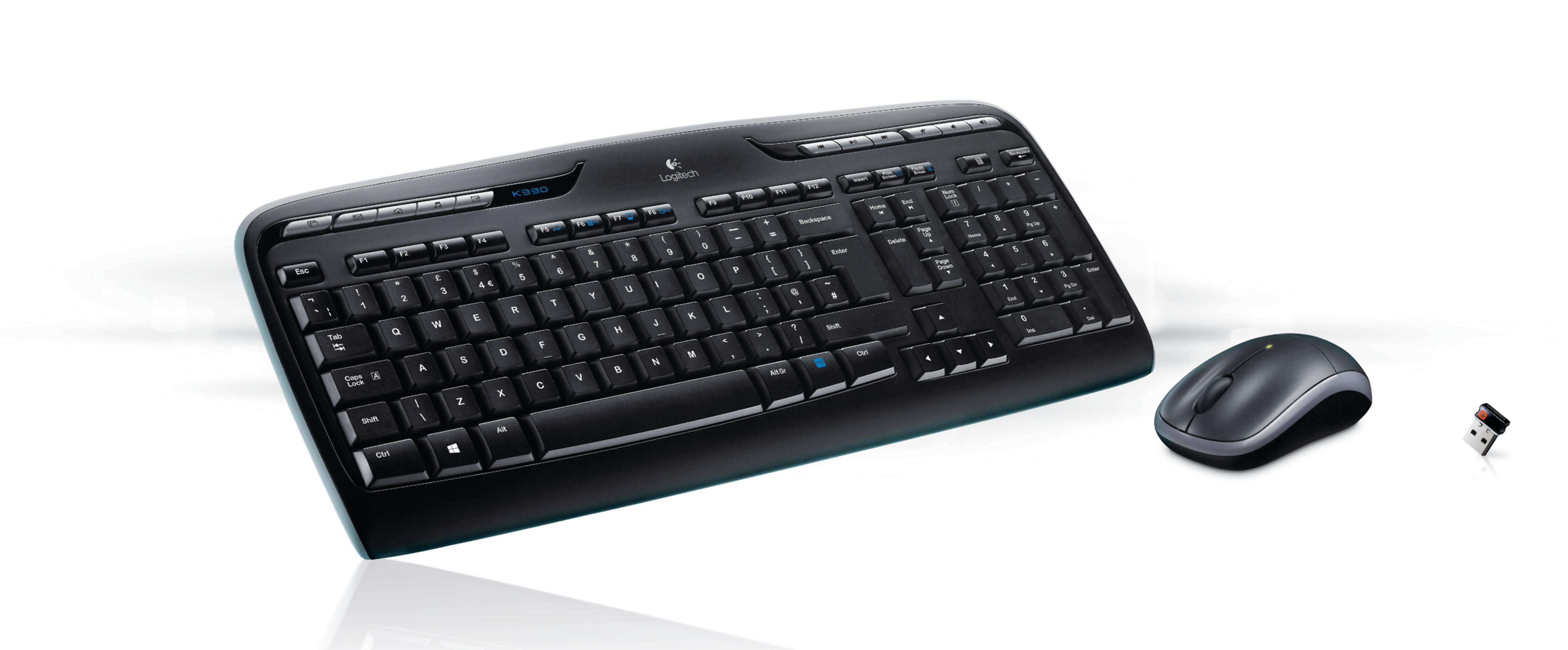 Un ensemble clavier et souris noir. Le clavier a une finition brillante et un récepteur USB.