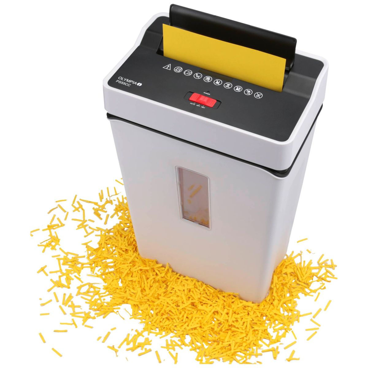 Destructora de papel blanca con papel triturado amarillo alrededor.
