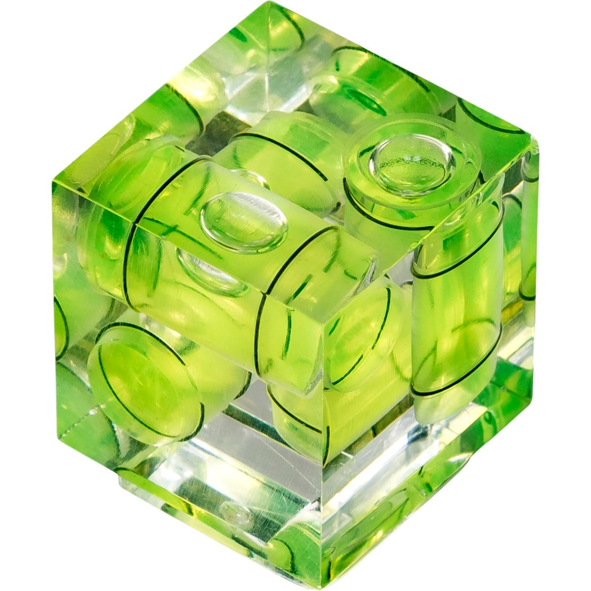 Przezroczysta kostka z zielonymi poziomami cieczy. Pęcherzyki powietrza są widoczne.