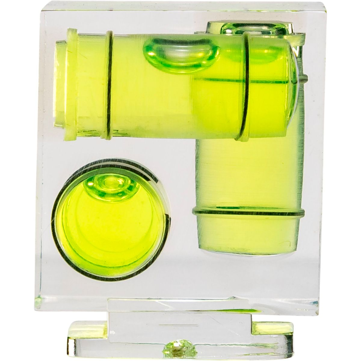 Przezroczysta kostka zawiera zielone poziomy z pęcherzykami. Urządzenie mierzy poziomy.