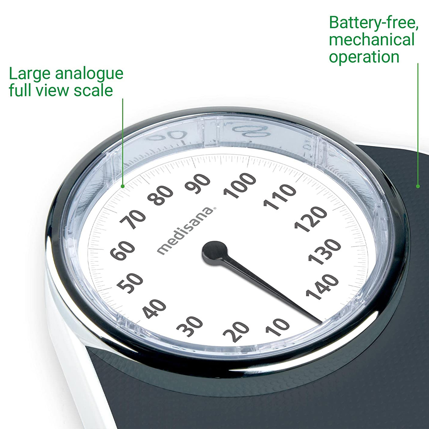 Okragła waga analogowa pokazująca liczby z czarną igłą, czarno-biały design, na białej powierzchni.