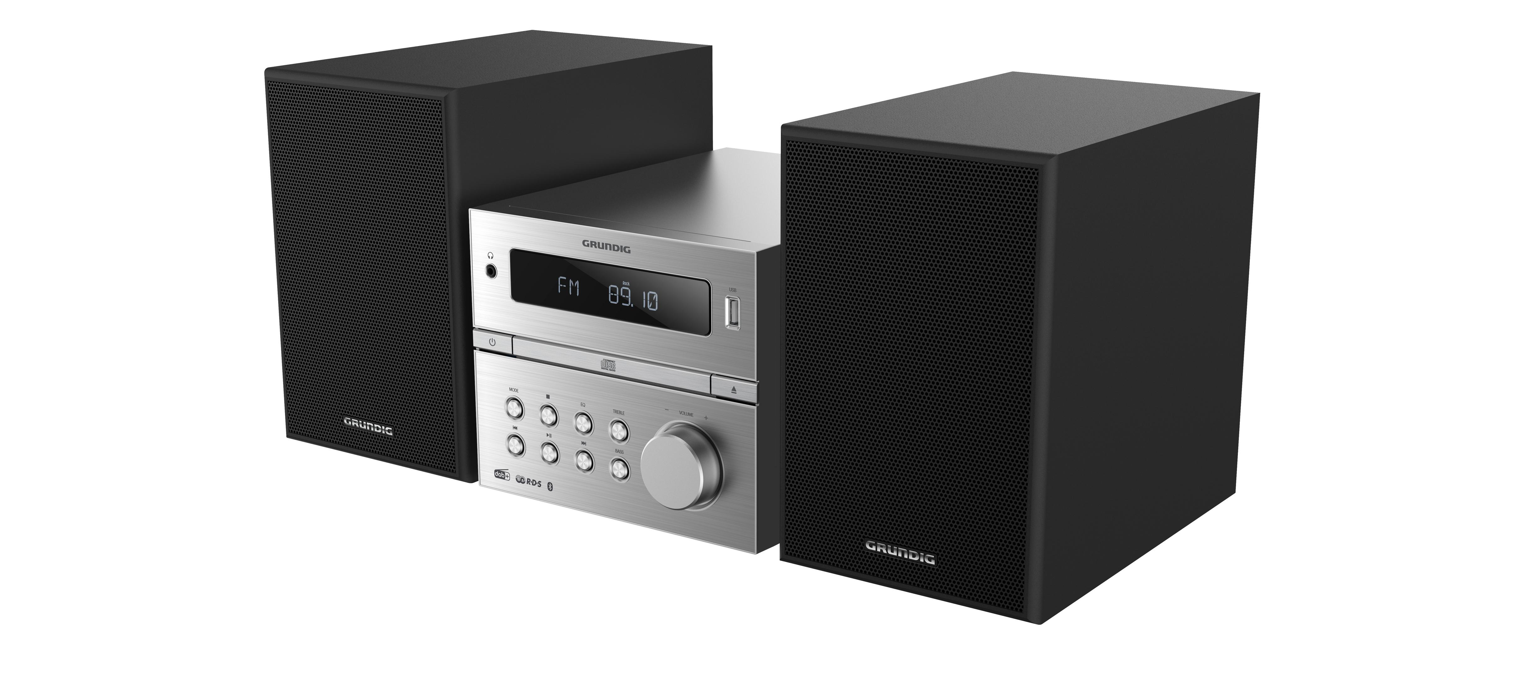 Un minicomponente estéreo Grundig plateado con dos altavoces negros. El sistema muestra la frecuencia de radio.