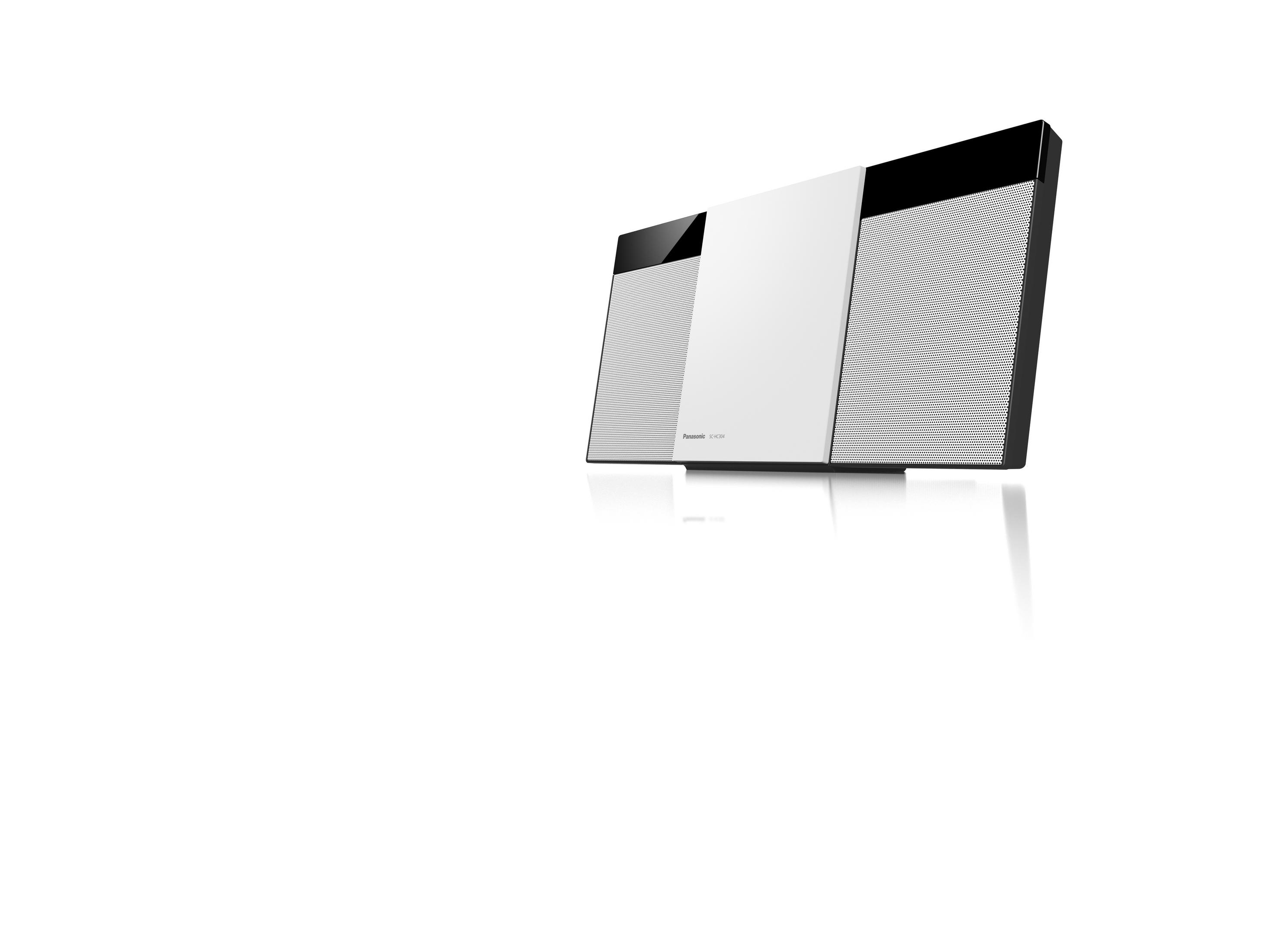 Weißes und schwarzes Soundsystem mit reflektierender Oberfläche vor weißem Hintergrund.