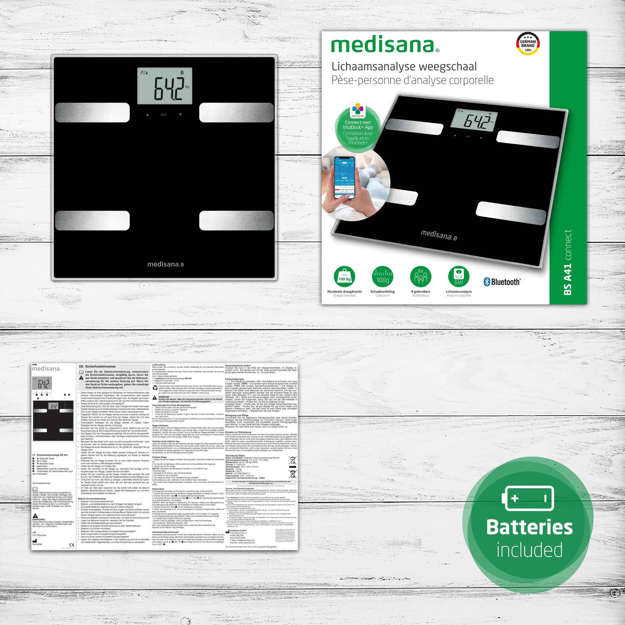 Bilancia digitale nera con display "642". Include anche una scatola del prodotto.