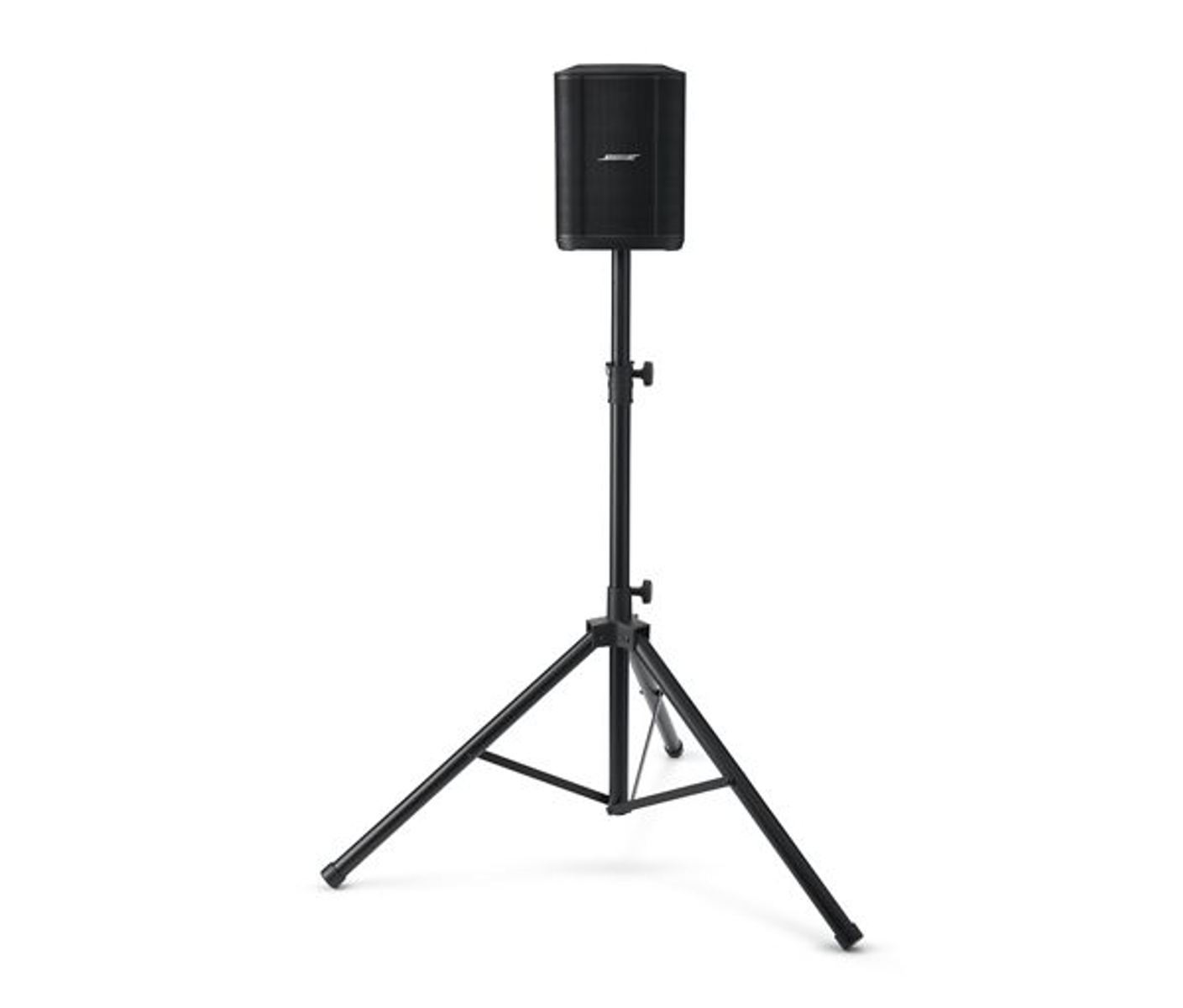 Altavoz negro sobre un trípode negro. Fondo blanco.