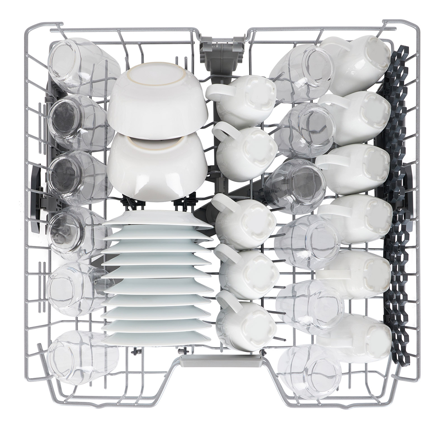 Widok z góry na kosz zmywarki ze szklankami i naczyniami. Czysto i uporządkowanie.