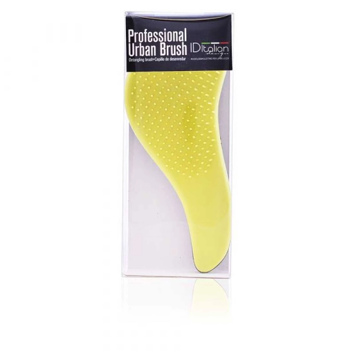 Un pettine giallo in una scatola di plastica trasparente, etichettato 'Professional Urban Brush'.
