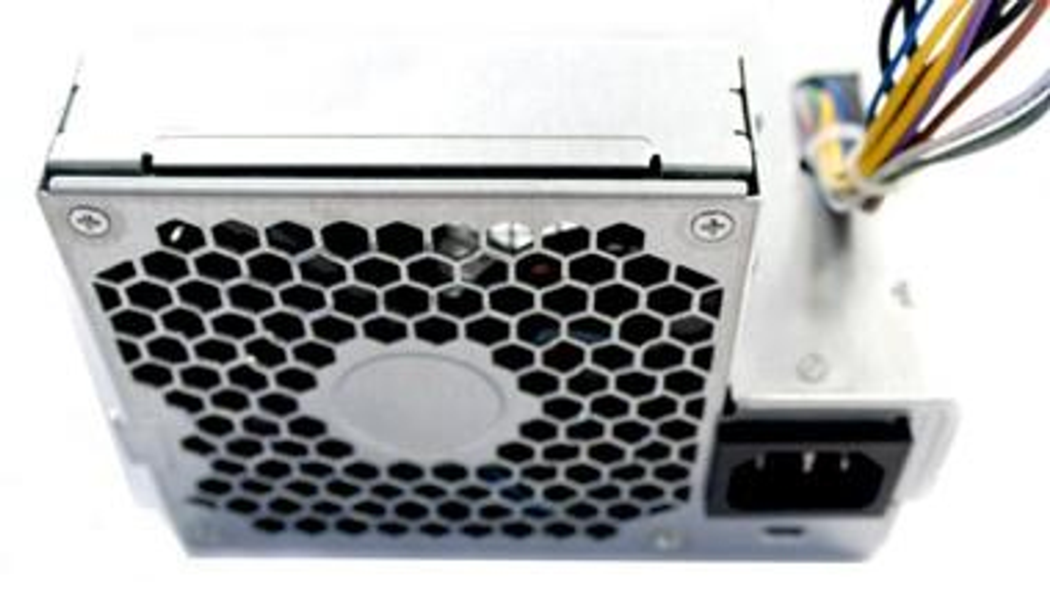 Alimentatore per computer. Ha una ventola, una presa d'aria e connettori. Colore grigio metallizzato.