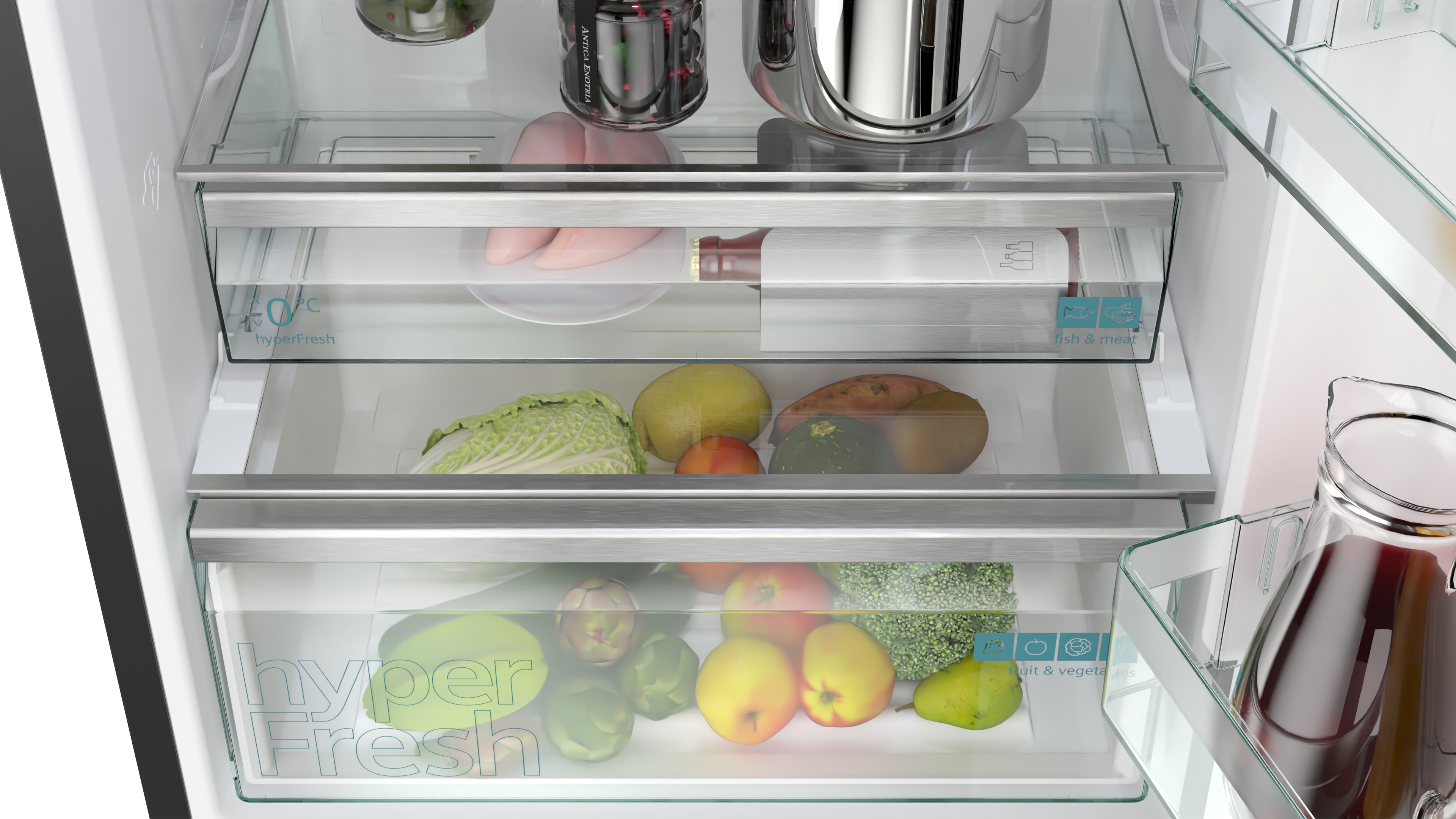 Wnętrze lodówki z dwiema szufladami. Są owoce, warzywa i butelka wina.