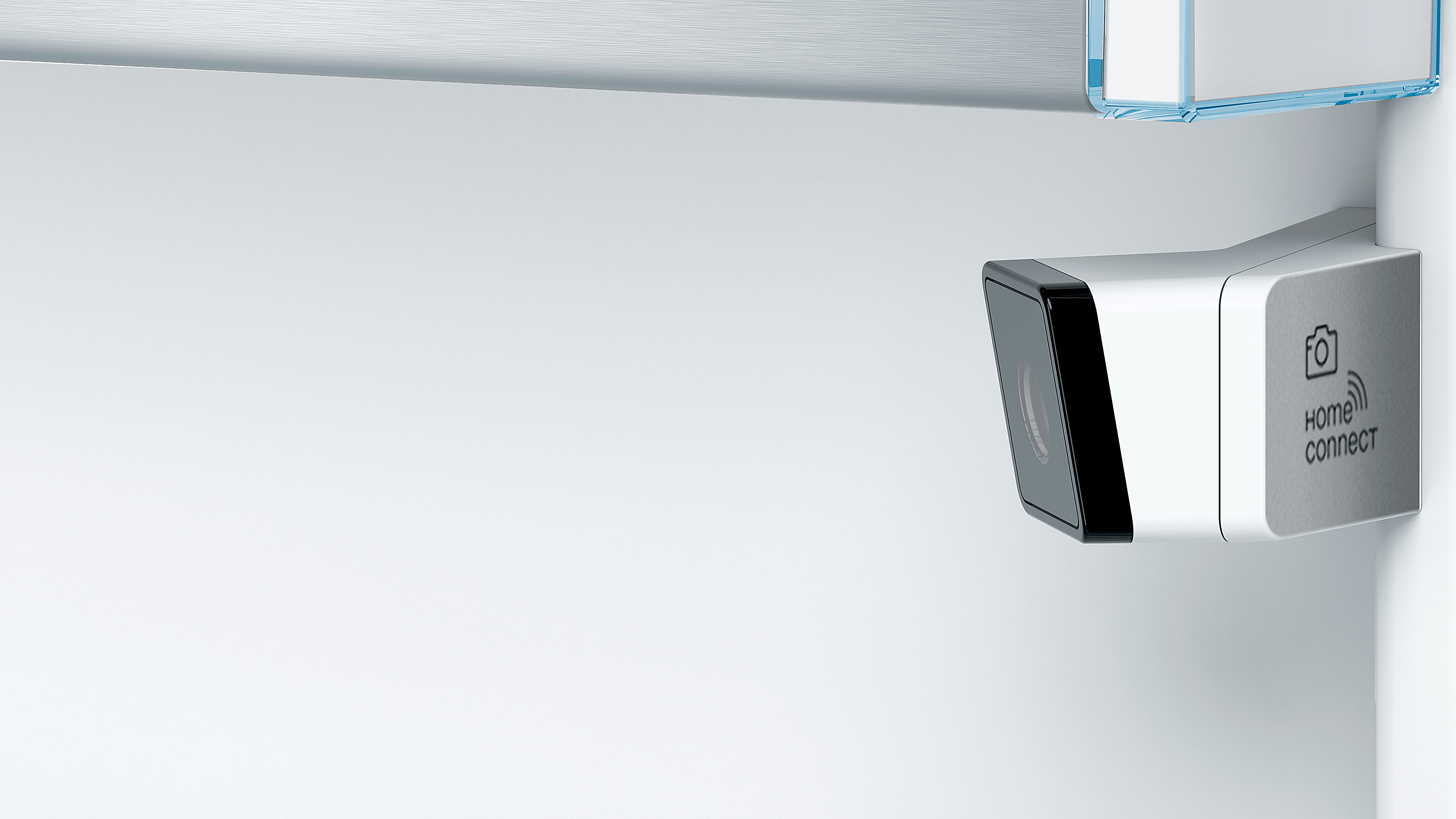 Una esquina blanca con una cámara Home Connect.