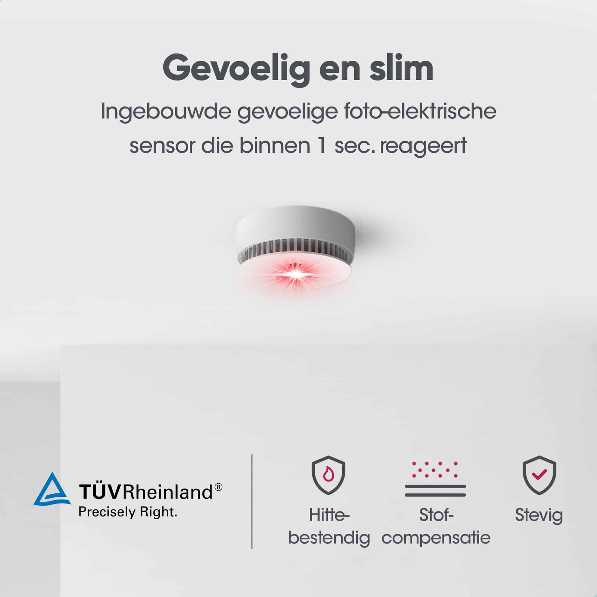 Detector de humo con luz roja, logo TÜV Rheinland y sellos de calor, polvo y estabilidad.