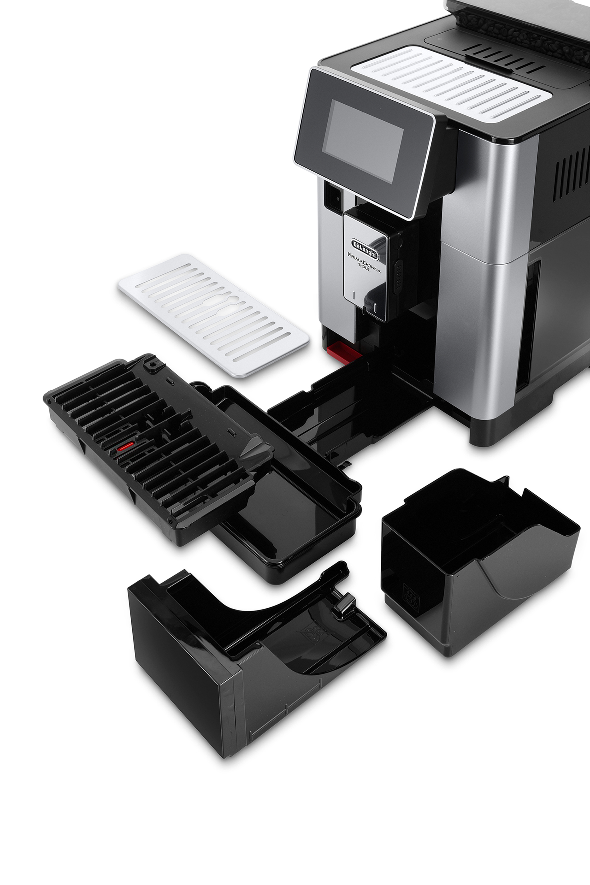 Zdemontowany ekspres do kawy pokazujący wewnętrzne komponenty.