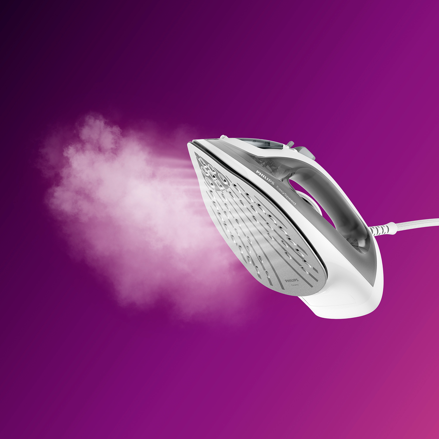 Una plancha Philips blanca y gris que emite vapor sobre un fondo degradado púrpura y rosa.