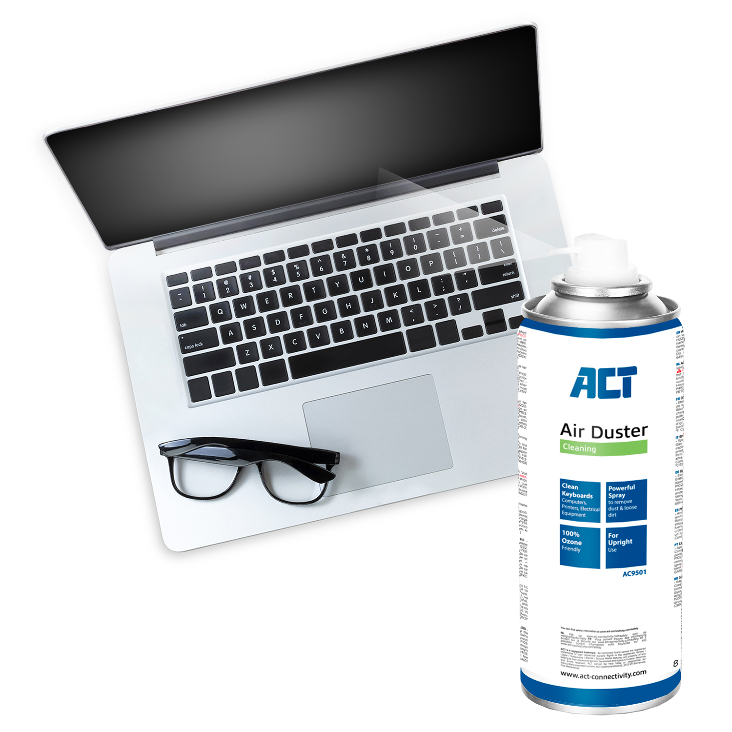 Laptop with cleaning spray and glasses, top-down view, white background.