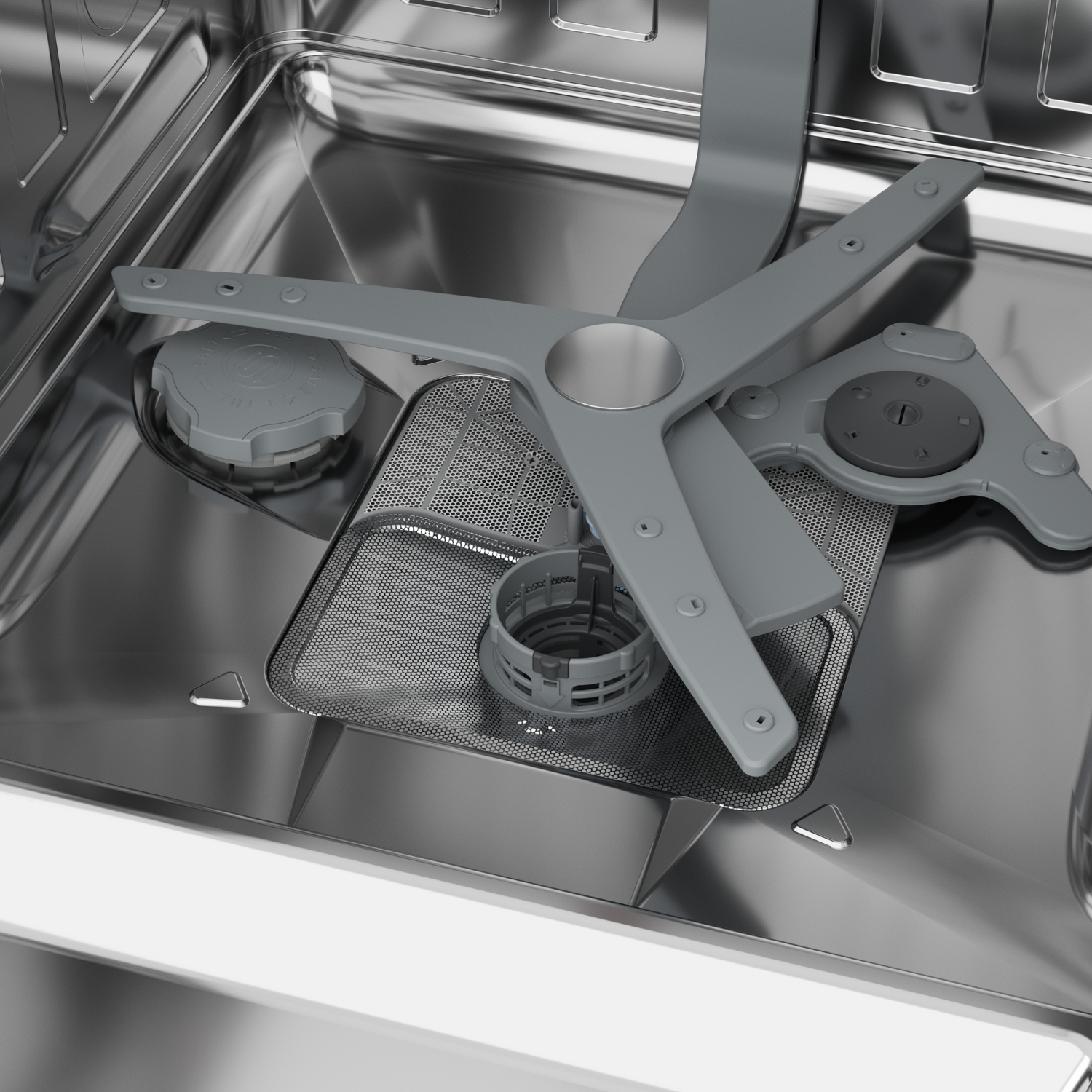 Interno lavastoviglie con spruzzatore rotante. Base in acciaio inox con filtro e bracci irroratori.
