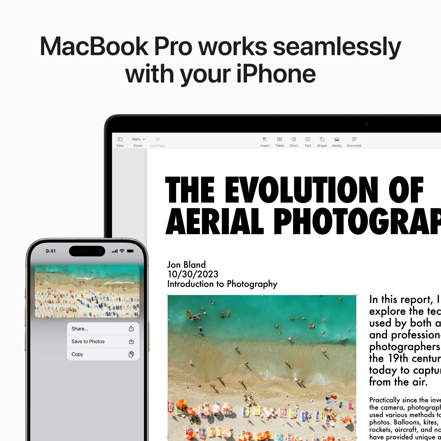 iPhone mostrando una foto. MacBook y texto en una mesa.