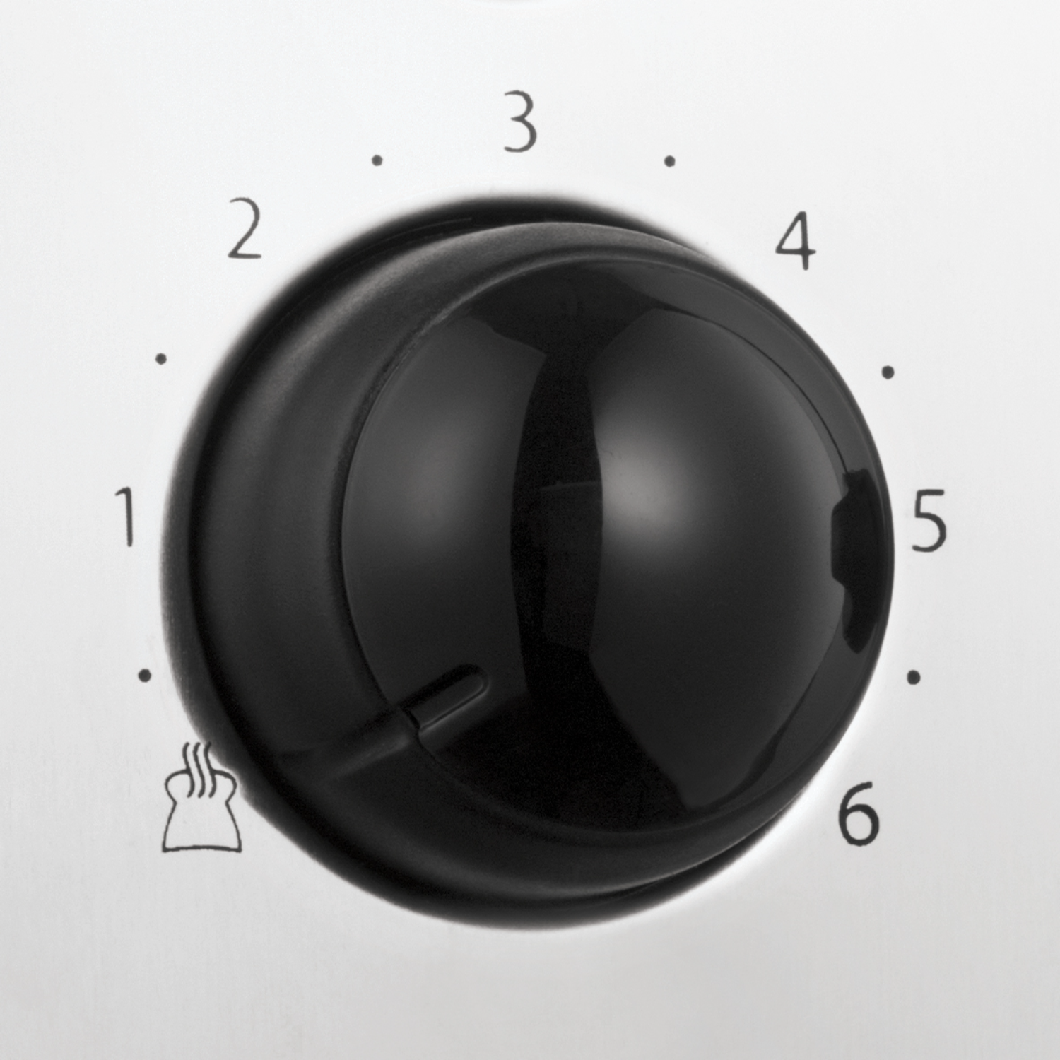 Czarny przycisk z numerami od 1 do 6. Obok numeru 1 wydrukowano ikonę tostera.